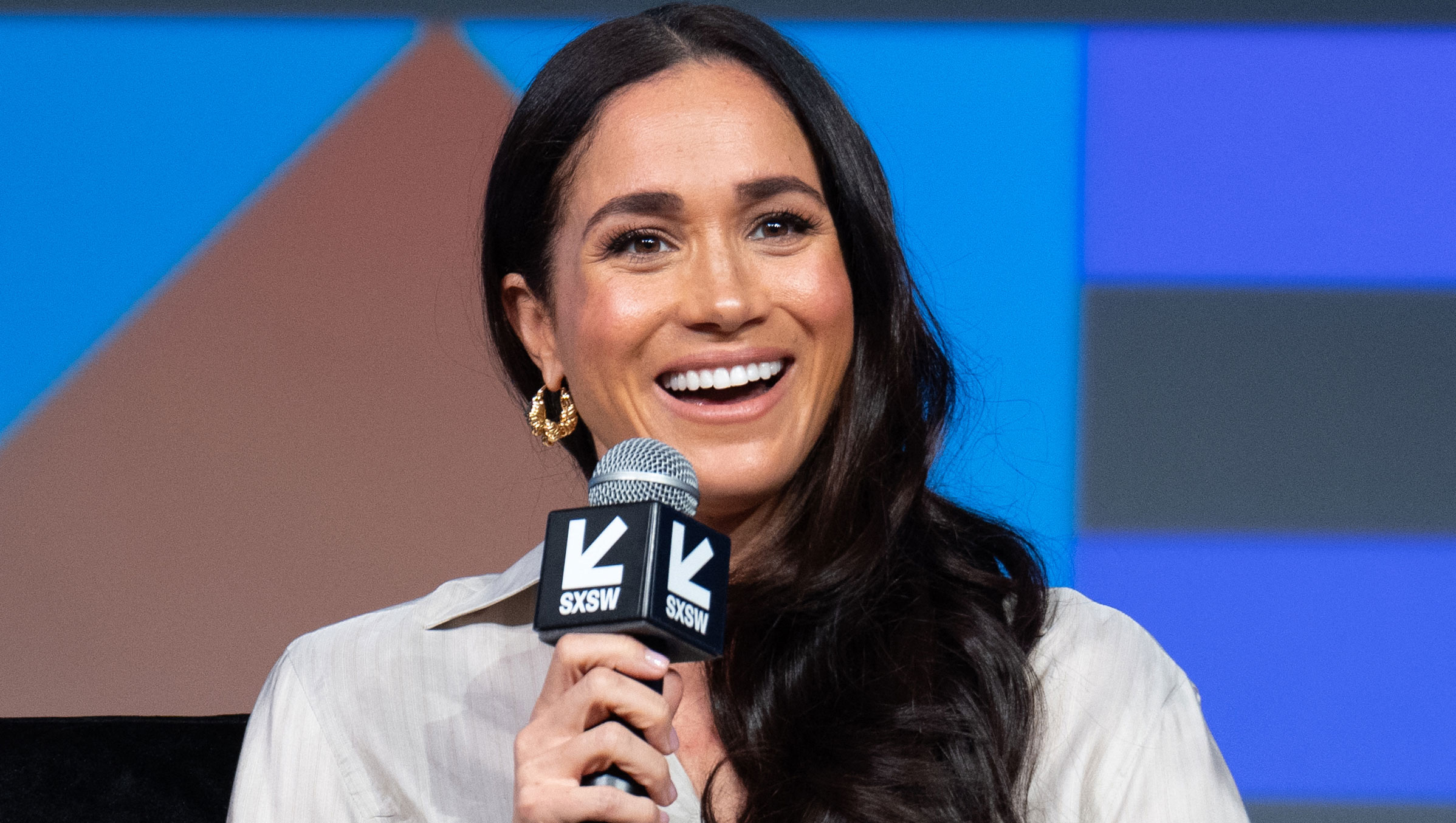 TOPSHOT - Britain's Meghan, Duchess of Sussex, attends the "Keynote: Breaking Barriers, Shaping Narratives: How Women Lead On and Off the Screen," during the SXSW 2024 Conference and Festivals at the Austin Convention Center on March 8, 2024, in Austin, Texas. (Photo by SUZANNE CORDEIRO / AFP) (Photo by SUZANNE CORDEIRO/AFP via Getty Images)