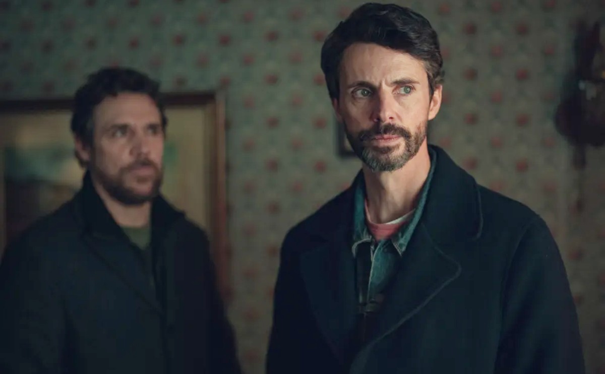 Two men stand in a room in 'Dept. Q.'