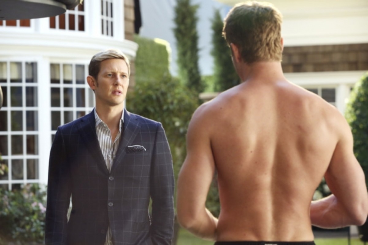 A man looks at another man in 'Revenge.'