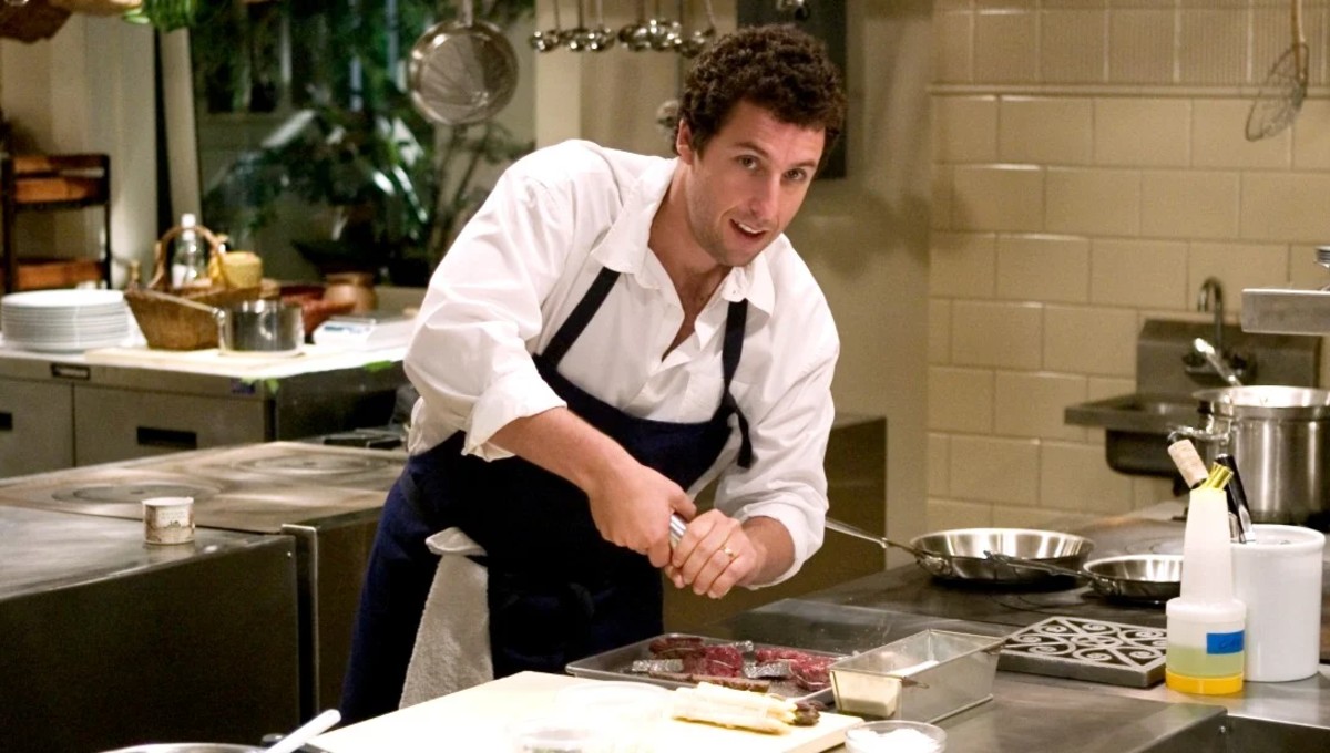 A man cooks in a kitchen in 'Spanglish.'