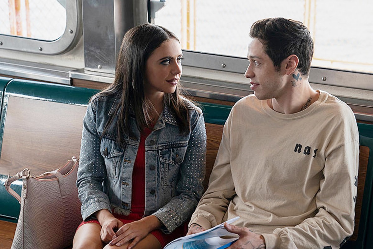 A man looks at a woman in 'The King of Staten Island.'