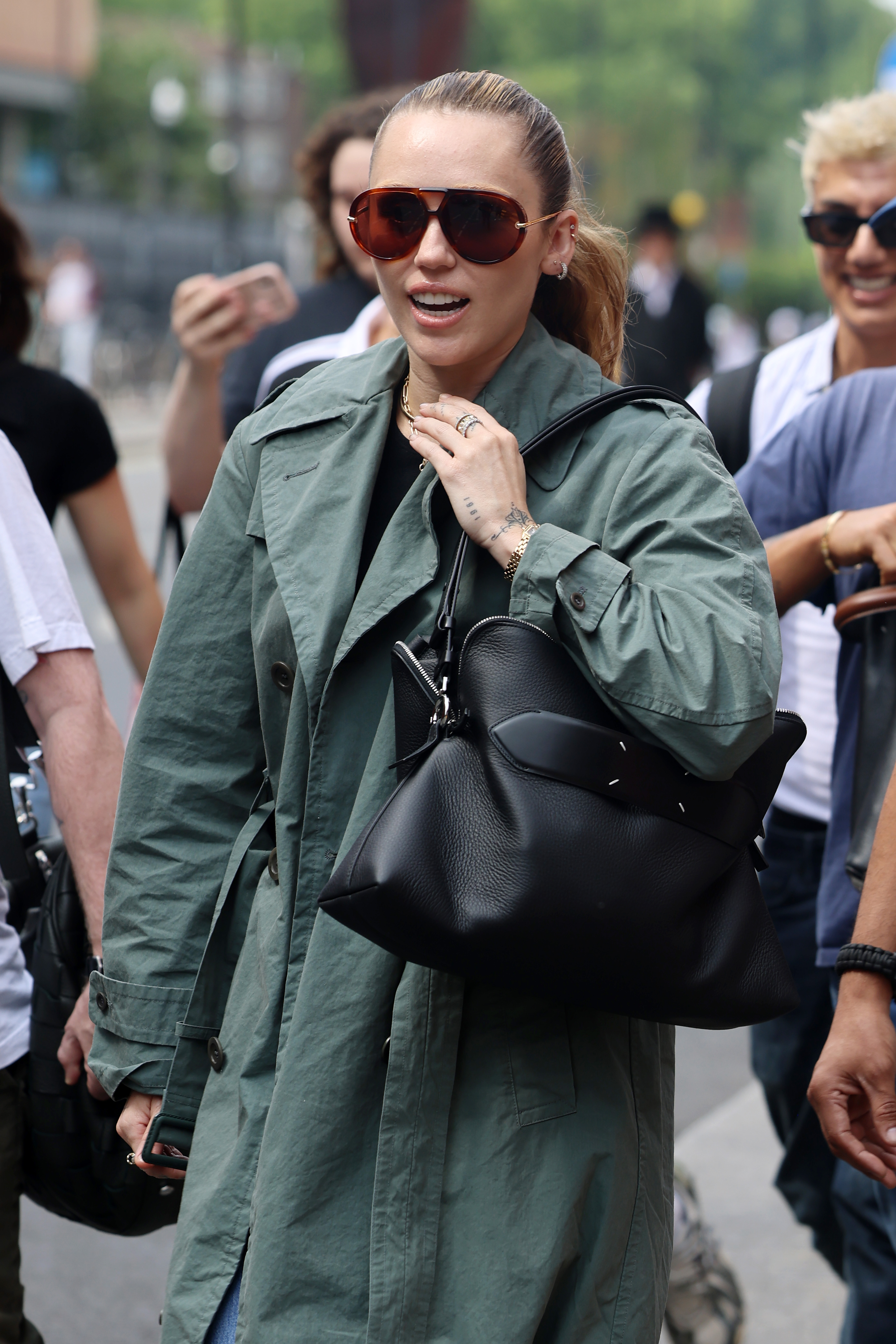 Miley Cyrus arriving at St Pancras International Eurostar from Paris on June 20, 2025 in London, England.