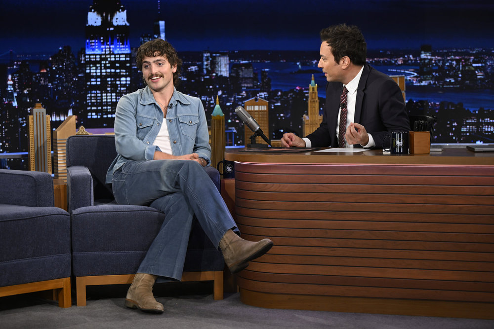 THE TONIGHT SHOW STARRING JIMMY FALLON -- Episode 2143 -- Pictured: (l-r) Singer-songwriter Benson Boone during an interview with host Jimmy Fallon on Wednesday, June 4, 2025 -- (Photo by: Todd Owyoung/NBC)