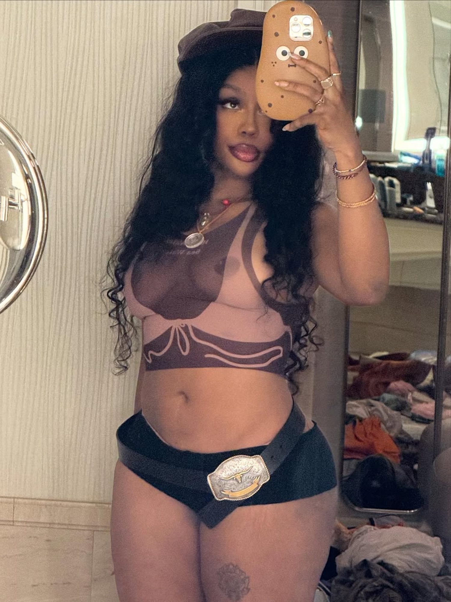 SZA Frees the Nip While Going Braless Underneath Sheer Top — And Fans Go Wild