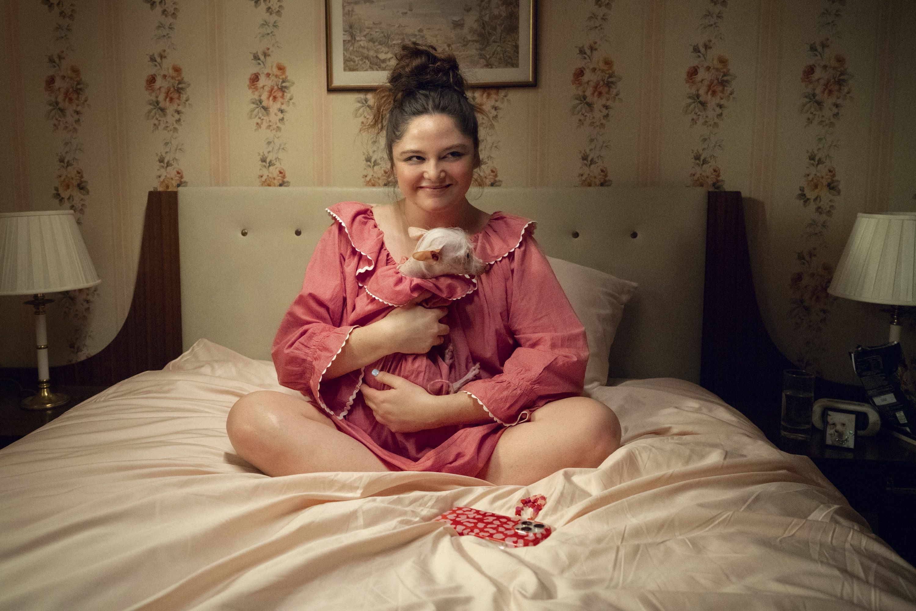 Megan Stalter with a dog in 'Too Much'