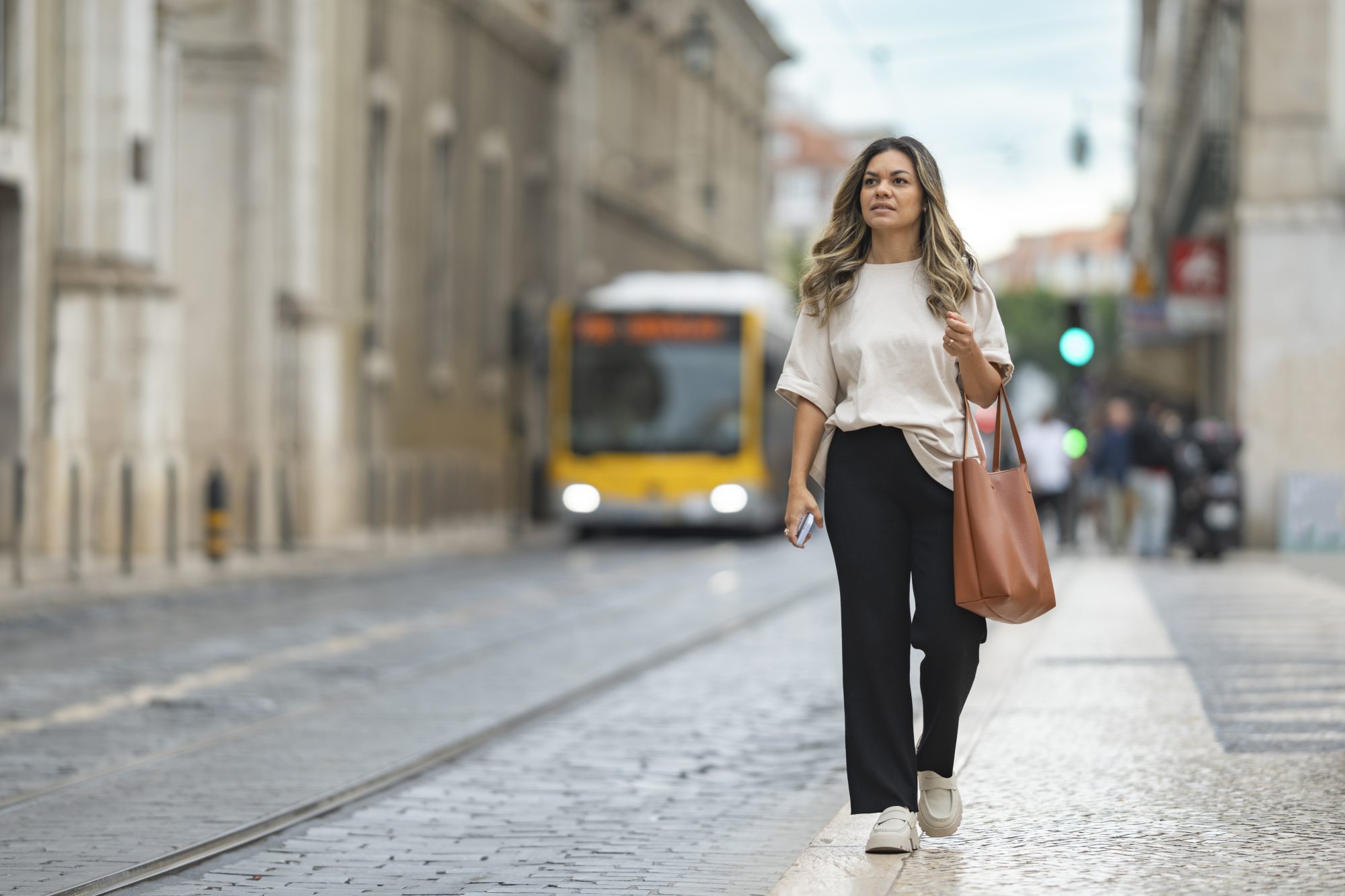 Tourist waiting for a bus in Lisbon