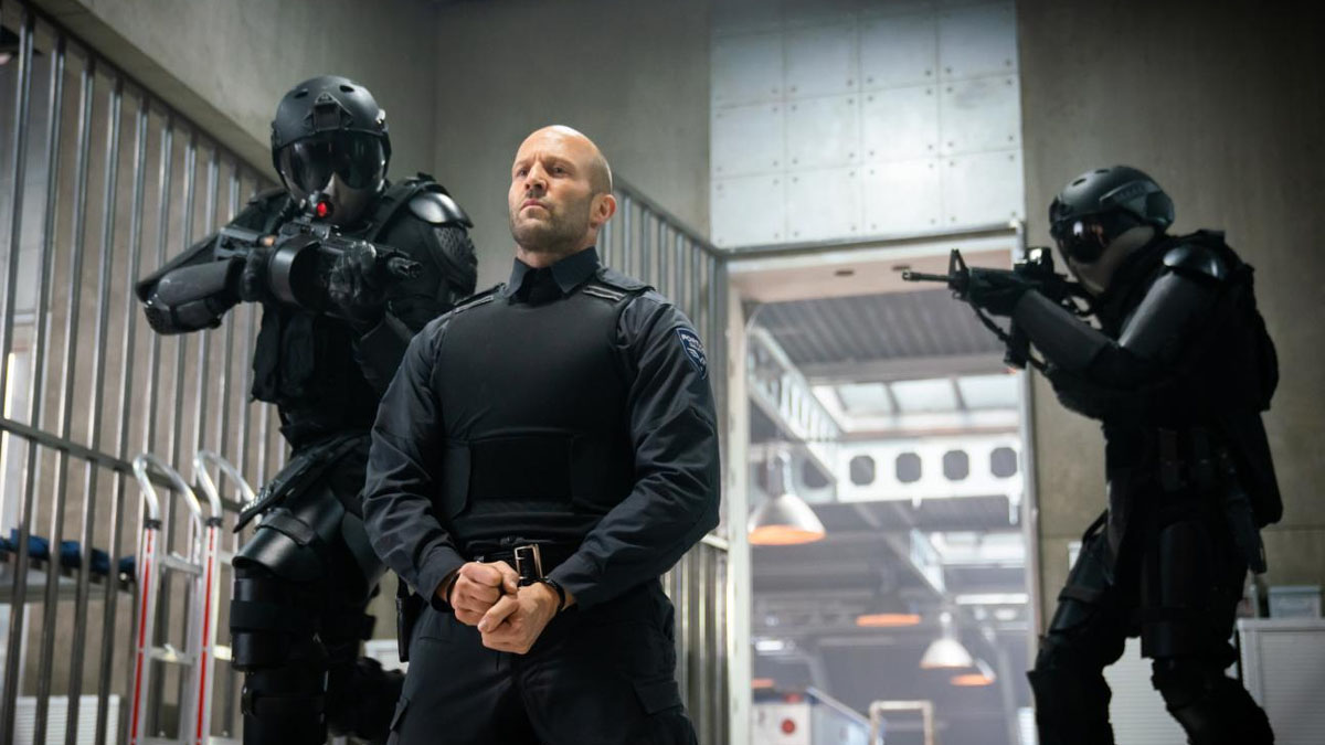 Jason Statham is held at gun point in Wrath of Man
