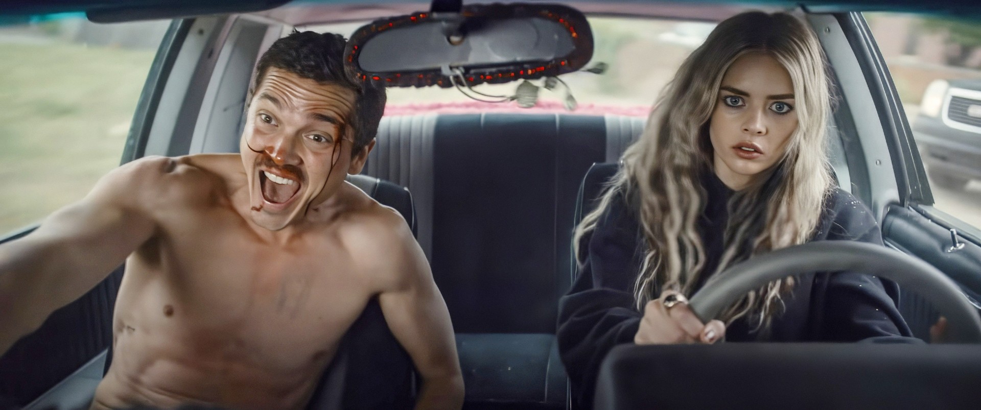 Karl Glusman and Samara Weaving in Eenie Meanie