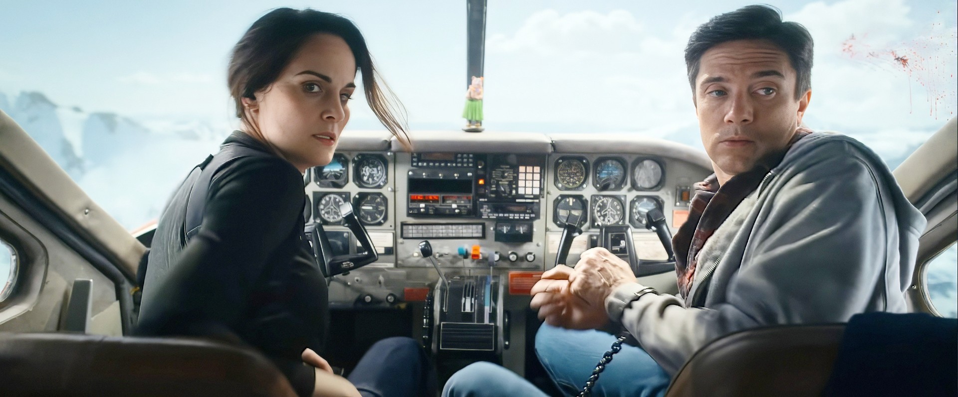 Michelle Dockery and Topher Grace in Flight Risk