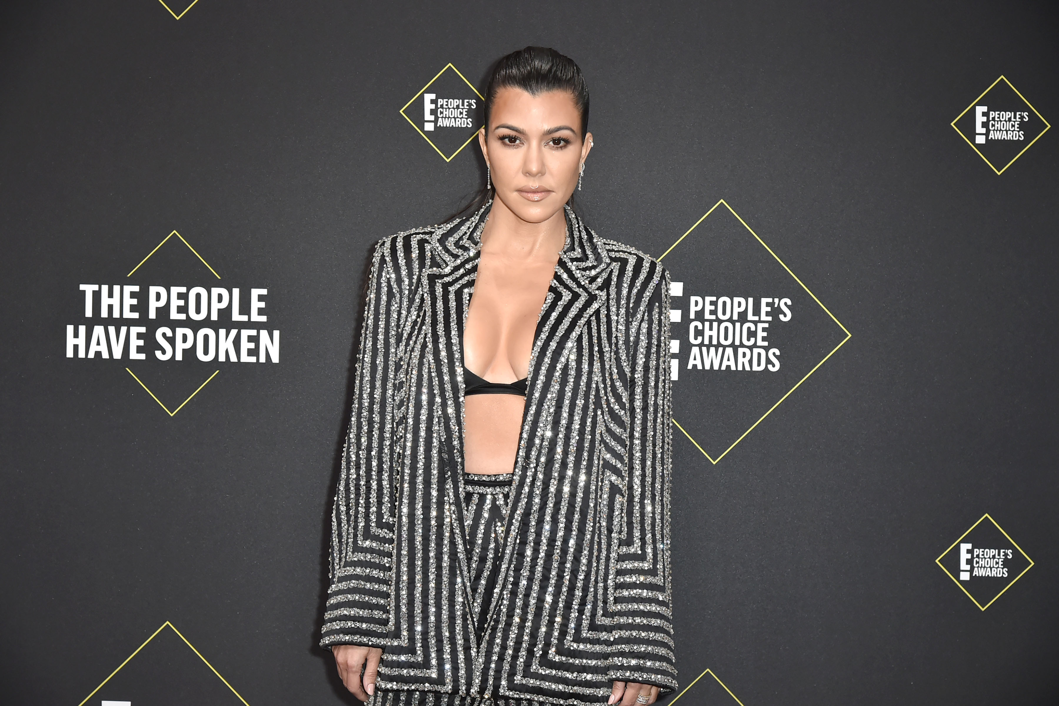SANTA MONICA, CALIFORNIA - NOVEMBER 10: Kourtney Kardashian attends 2019 E! People's Choice Awards - Arrivals at The Barker Hanger on November 10, 2019 in Santa Monica, California. (Photo by David Crotty/Patrick McMullan via Getty Images)