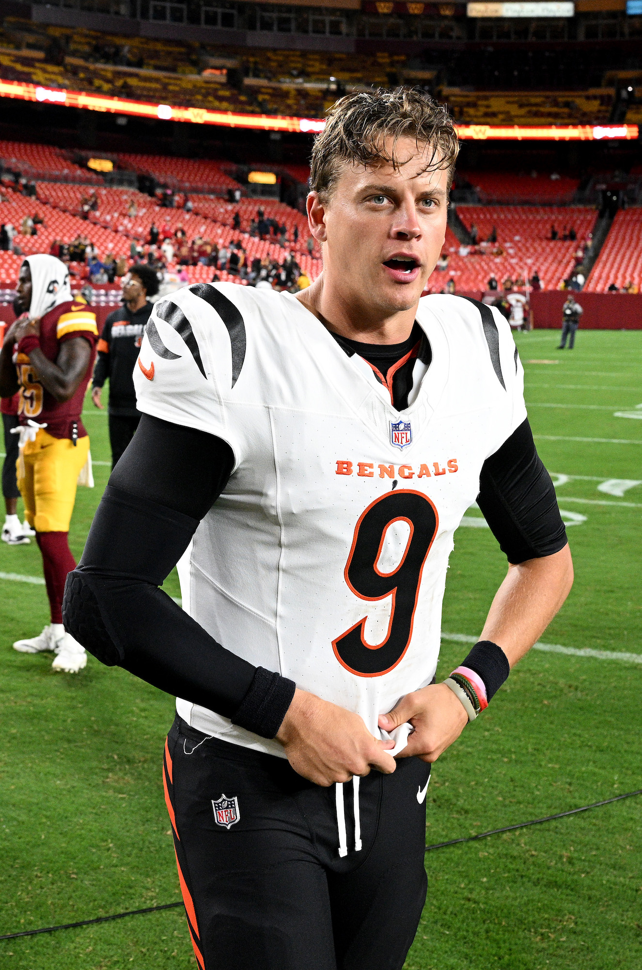 The Cincinnati Bengals will reportedly be without the services of their superstar quarterback, Joe Burrow, for months after suffering an injury to his toe. Burrow, 28, requires surgery and will be sidelined for at least three months, according to ESPN’s Adam Schefter. The injury happened during the second quarter of the Browns’ game against the Jacksonville Jaguars on Sunday, September 14. After being sacked by the Jaguars’ Arik Armstead, Burrow was left at the bottom of a pile of players. Burrow attempted to walk off the injury, but fell to the field after a few steps. After being evaluated in the blue medical tent on the sidelines, Burrow required assistance to make it back to the Bengals locker room. After the game, Burrow was seen in the locker room wearing a walking boot and using crutches. In his absence, backup quarterback Jake Browning still managed to lead the Bengals to a 31-27 victory. Browning, 29, completed 21 of 32 passes for 241 yards and two passing touchdowns. His rushing touchdown with 18 seconds remaining sealed the victory for the Bengals. “Jake’s been in there and done it with us before,” said Bengals wide receiver Tee Higgins, who caught a 42-yard touchdown pass from Browning, after the game.. “It was a no-brainer. We had faith in him to step in with no hesitation and no setbacks.” A former quarterback at the University of Washington, Browning has been the Bengals’ backup for the past two seasons. Browning appeared in nine games in the 2023 season, starting in seven of them, after Burrow suffered a season-ending wrist injury. “When he comes in, he wins ball games,” Bengals center Ted Karras said after the game on Sunday. “No fear, no panic, got it done. That’s my guy. I think he’s obviously a starter in this league. We’re blessed to have good depth there. It sucks we have to test it.” Despite the team’s faith in Browning, frustration was palpable in the locker room after the game. Bengals wide receiver Ja’Marr Chase said, “Emotions are very, very high right now.” “The resilient group found a way,” Bengals head coach Zac Taylor added. “It feels like that’s what this year is turning into already.” The Bengals return to action on Sunday, September 21, when they travel to Minneapolis to face the Minnesota Vikings.