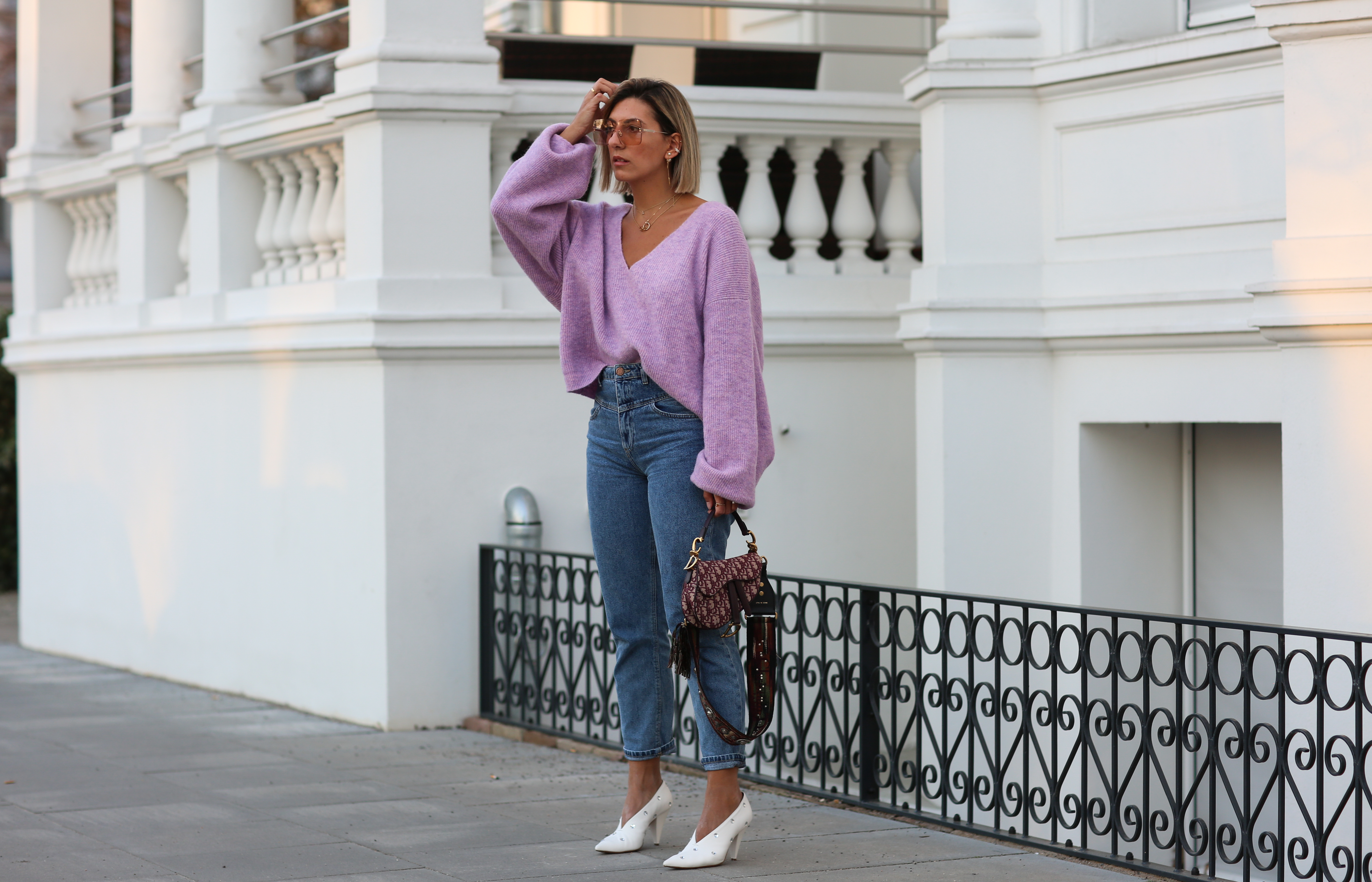 HAMBURG, GERMANY - FEBRUARY 18: Aylin Koenig wearing Stradivarius jeans, Celine shoes, Dior bag, by Aylin Koenig sweater, Dior sunglasses on February 18, 2019 in Hamburg, Germany. (Photo by Jeremy Moeller/Getty Images)