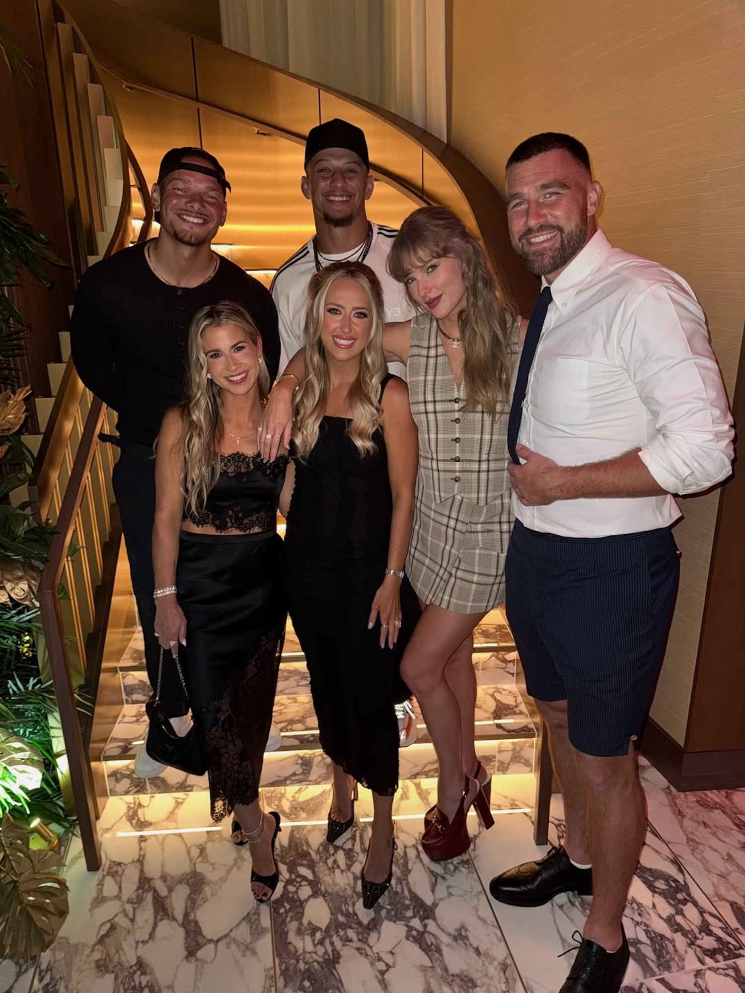 Taylor Swift Wears a $150 Vest and Skirt With Travis Kelce While Celebrating Patrick Mahomes’ Bday