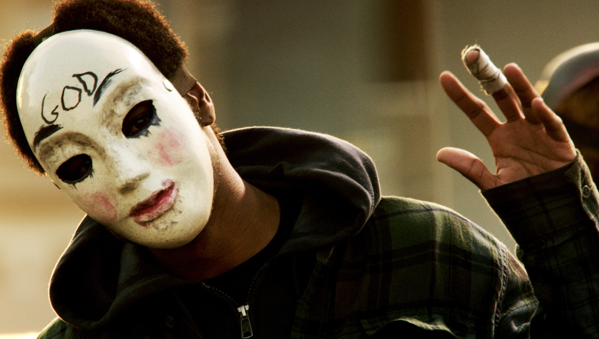 A masked man in The Purge Anarchy