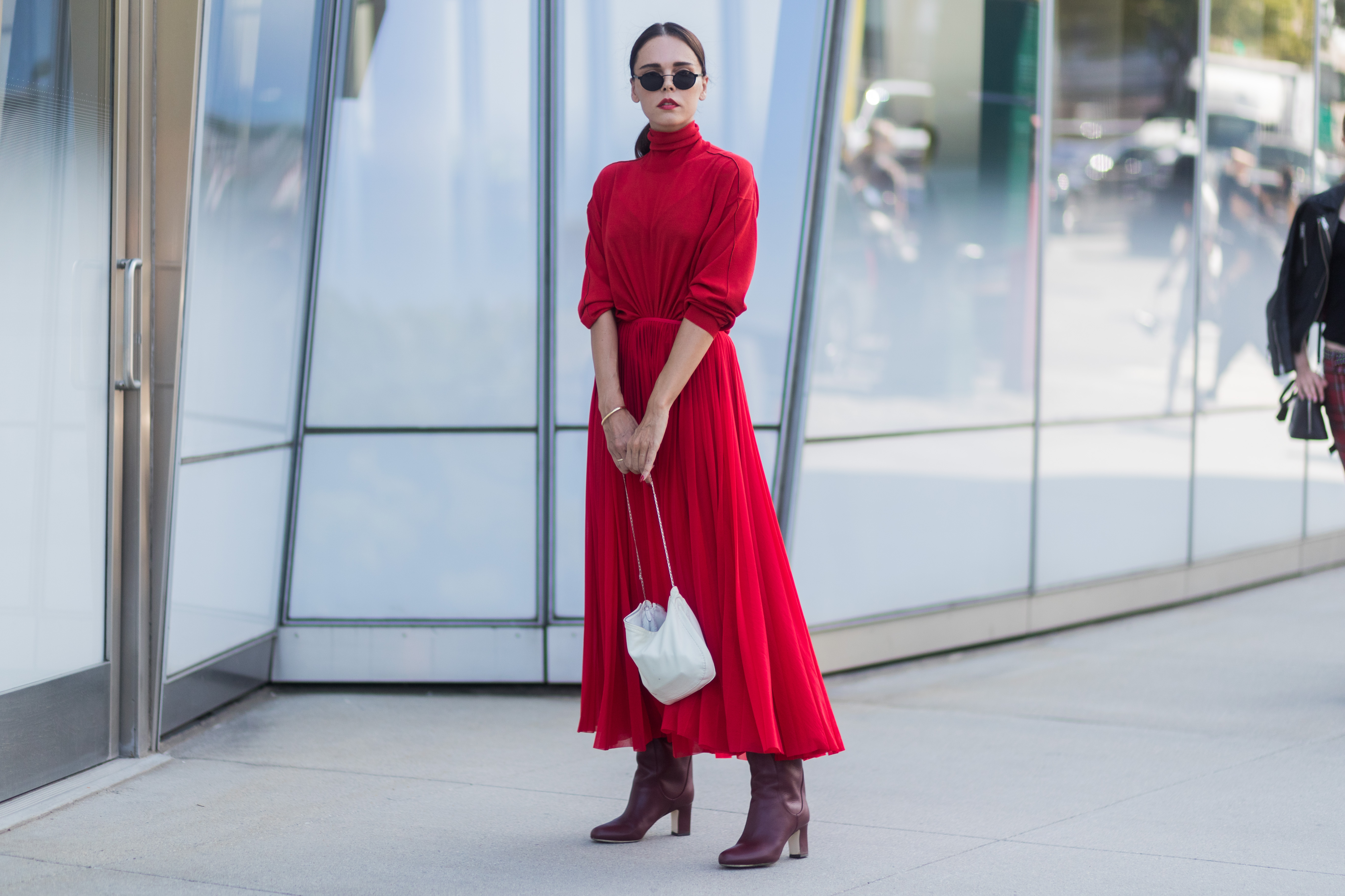 Evangelie Smyrniotaki wearing red dress seen in the streets of Manhattan outside Delpozo during New York Fashion Week on September 13, 2017 in New York City.