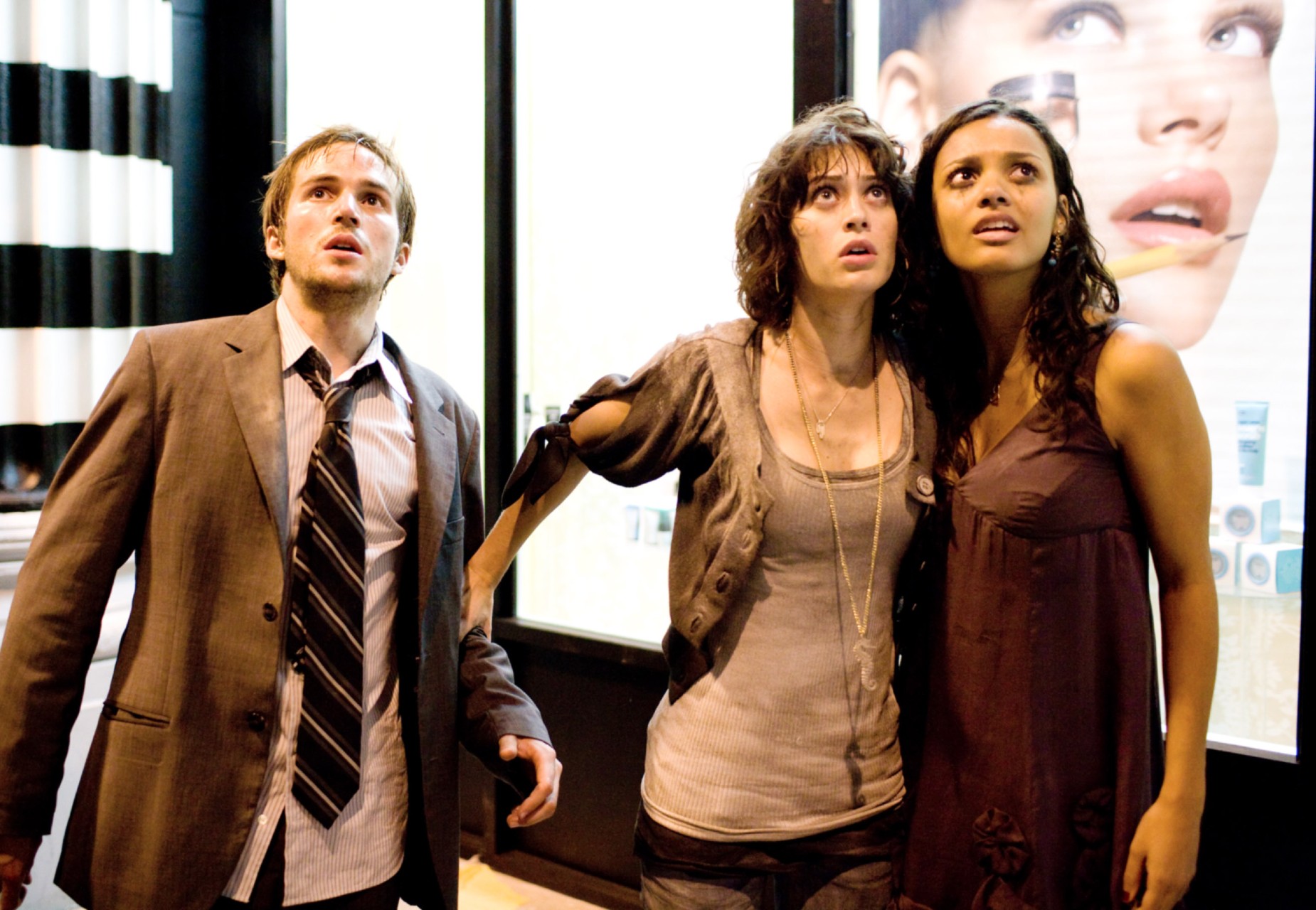 Michael Stahl-David, Lizzy Caplan and Jessica Lucas in Cloverfield