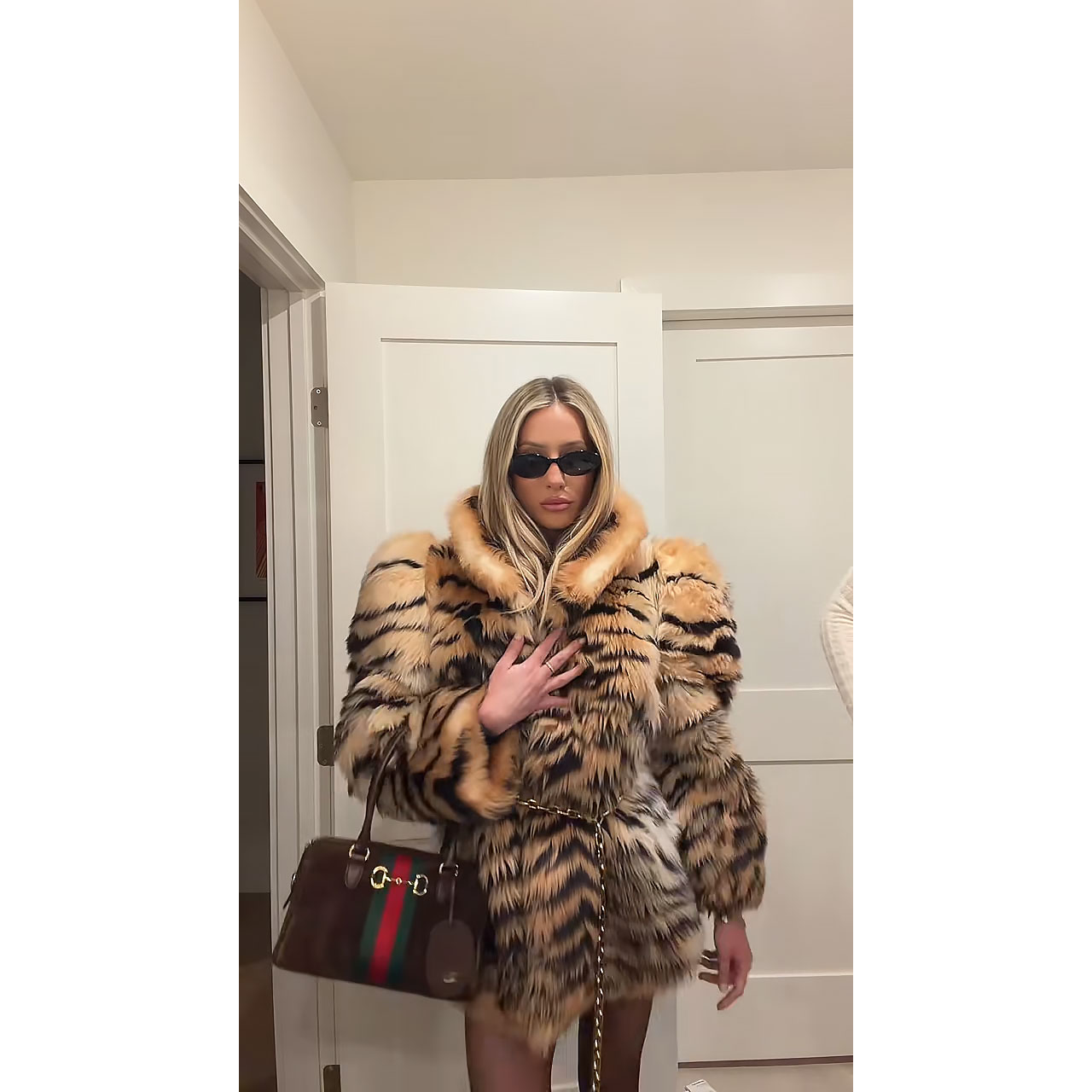 Feature Alix Earle Rocks 51K Gucci Outfit With Tiger Striped Fur Coat and Designer Bag
