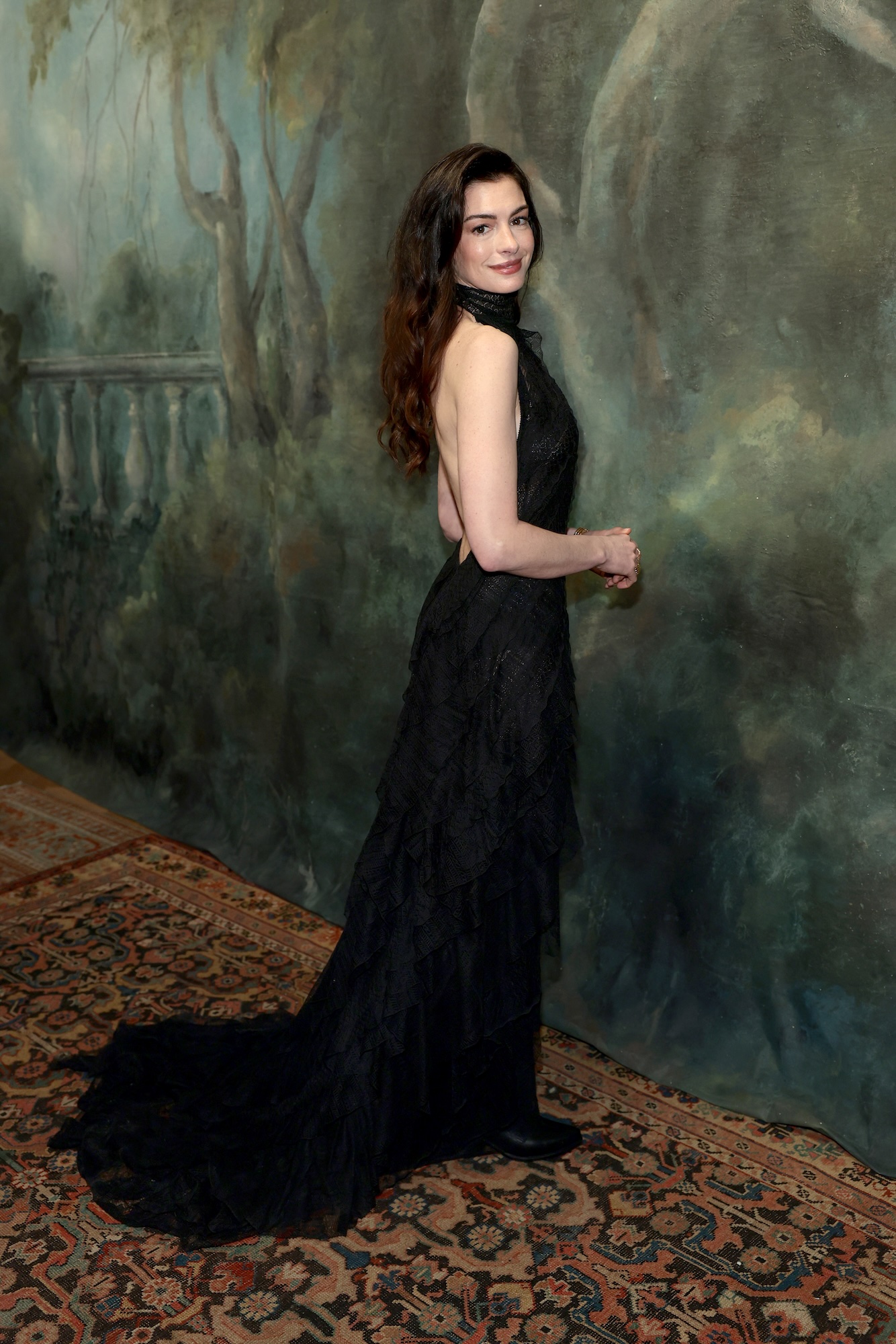 Anne Hathaway Is Ageless in a Semi-Sheer Dress at Ralph Lauren Fashion Show