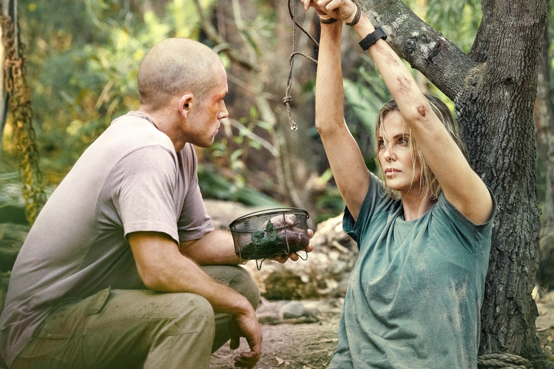 Taron Egerton and Charlize Theron in Apex