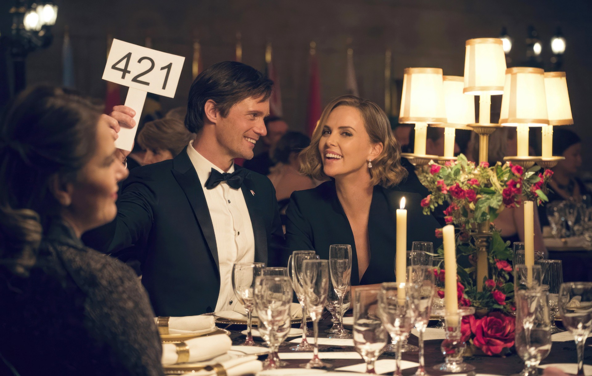 Alexander Skarsgard and Charlize Theron in Long Shot