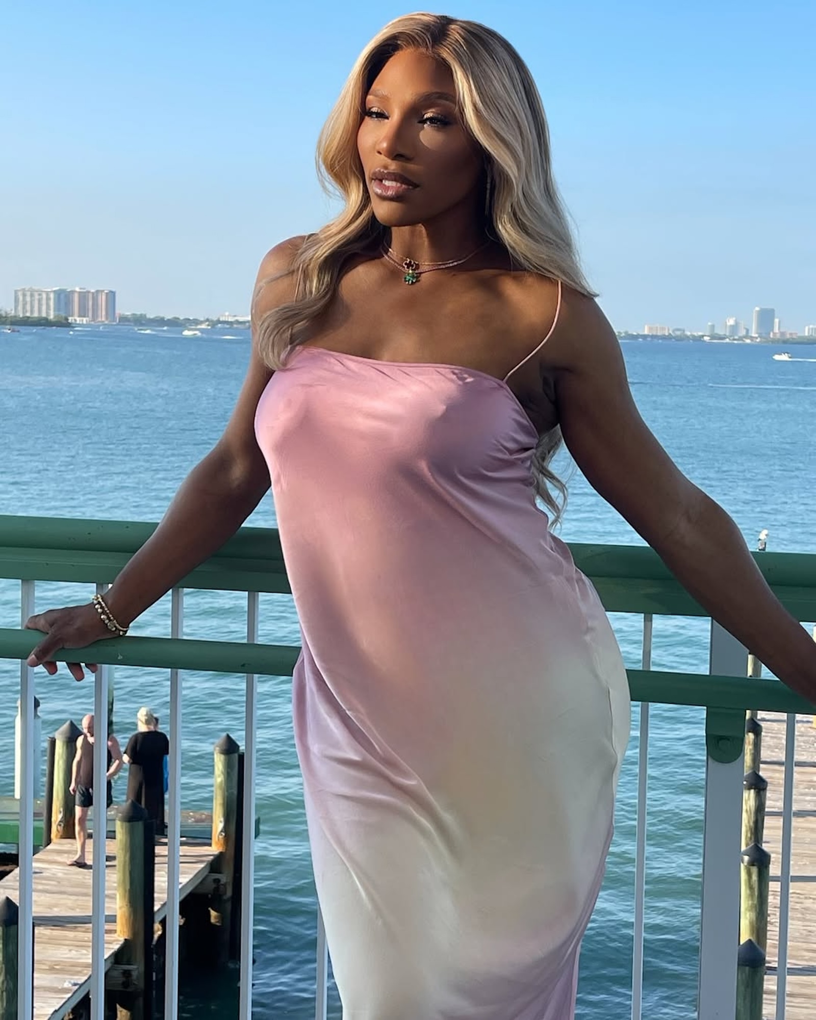 Serena Williams Goes Braless Underneath a Pink Silk Dress After Weight Loss