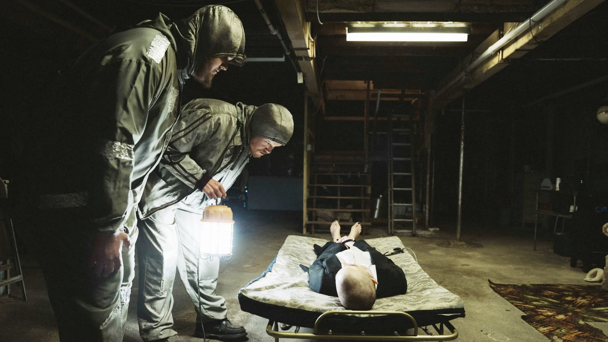 Aidan Delbis, Jesse Plemons and Emma Stone in Bugonia
