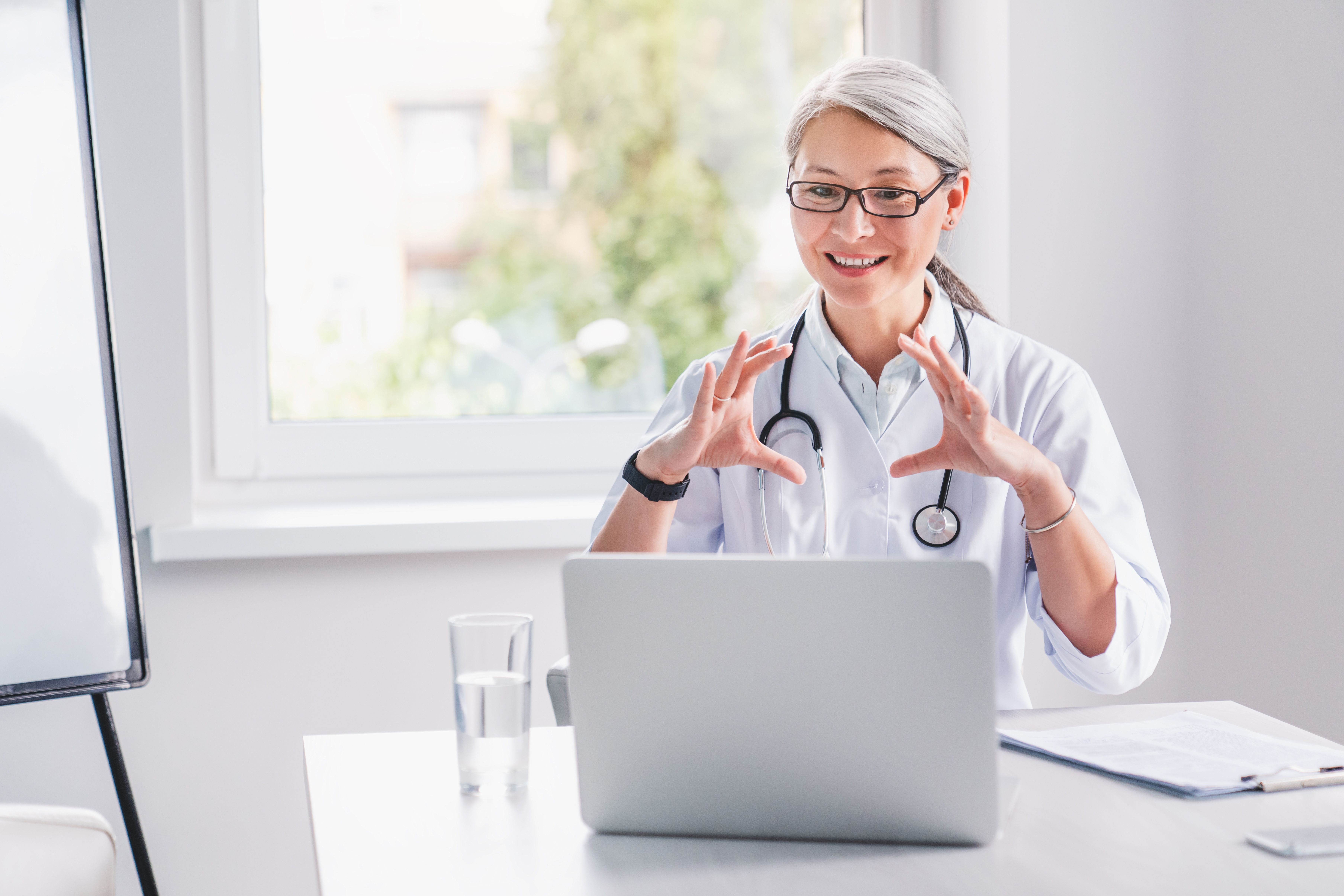 Telemedicine.,Middle,Age,Female,Doctor,Making,Video,Call,Or,Live