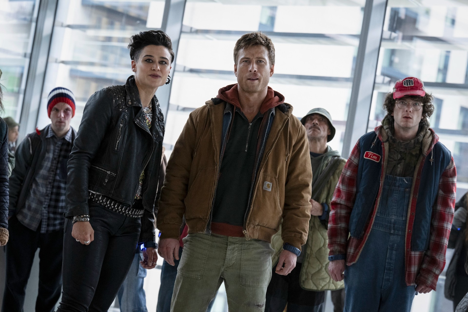 Katy O'Brian, Glen Powell and Martin Herlihy in The Running Man