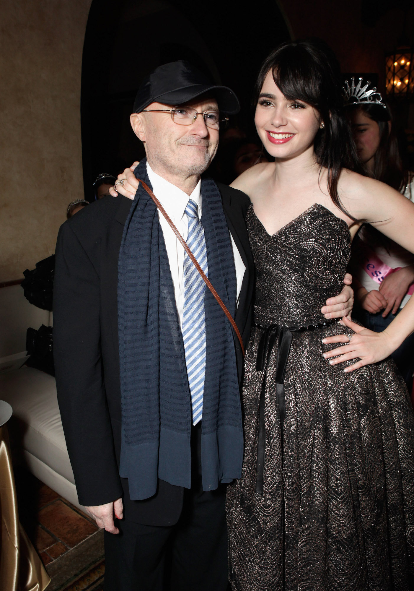 Phil-and-Lily-Collins-GettyImages-141504943
