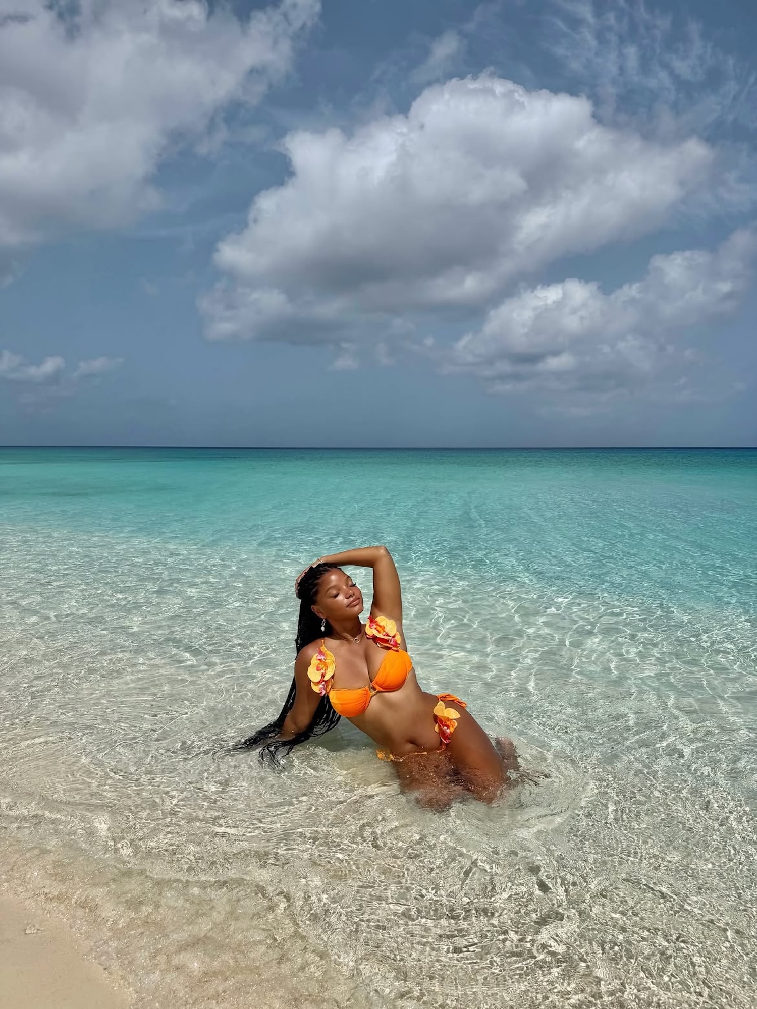 Halle Bailey Channels Her Inner Mermaid in a Glamorous Floral Bikini on Vacation