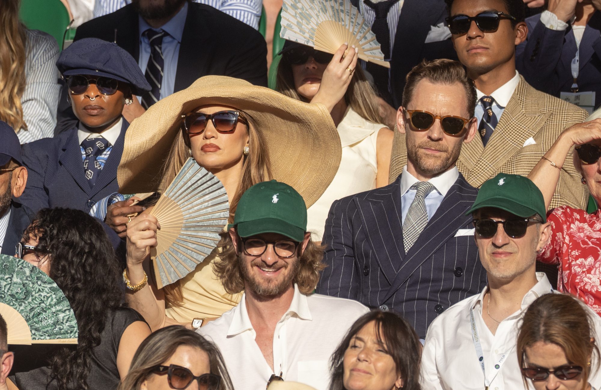 LONDON, ENGLAND - July 12: Jennifer Lopez and Tom Hiddleston in the stands watching Jannik Sinner of Italy playing Alexander Zverev of Germany in the Gentlemen's Singles Final on Centre Court at the All England Lawn Tennis and Croquet Club during the Wimbledon Lawn Tennis Championships on July 12th, 2026, in London, England. (Photo by Tim Clayton/Getty Images)