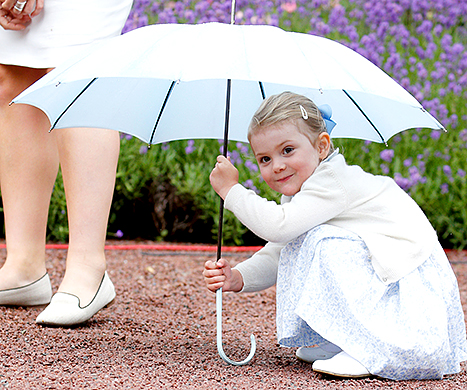 Princess Estelle hiding under umbrella