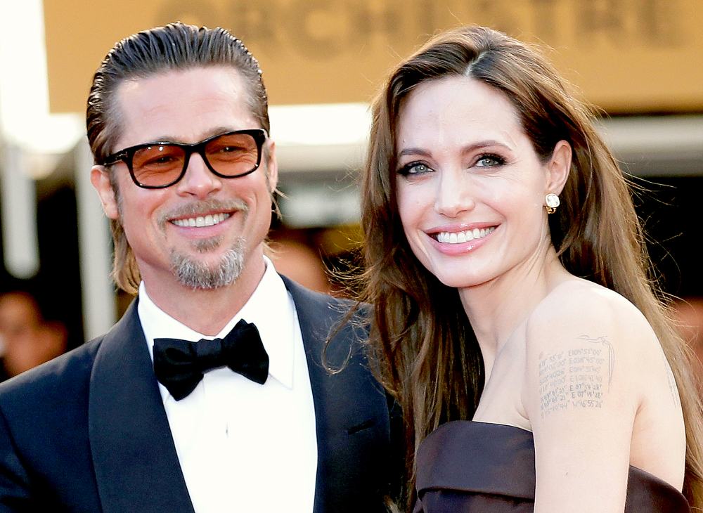 Angelina Jolie and Brad Pitt attend "The Tree Of Life" premiere during the 64th Annual Cannes Film Festival at Palais des Festivals on May 16, 2011 in Cannes, France.