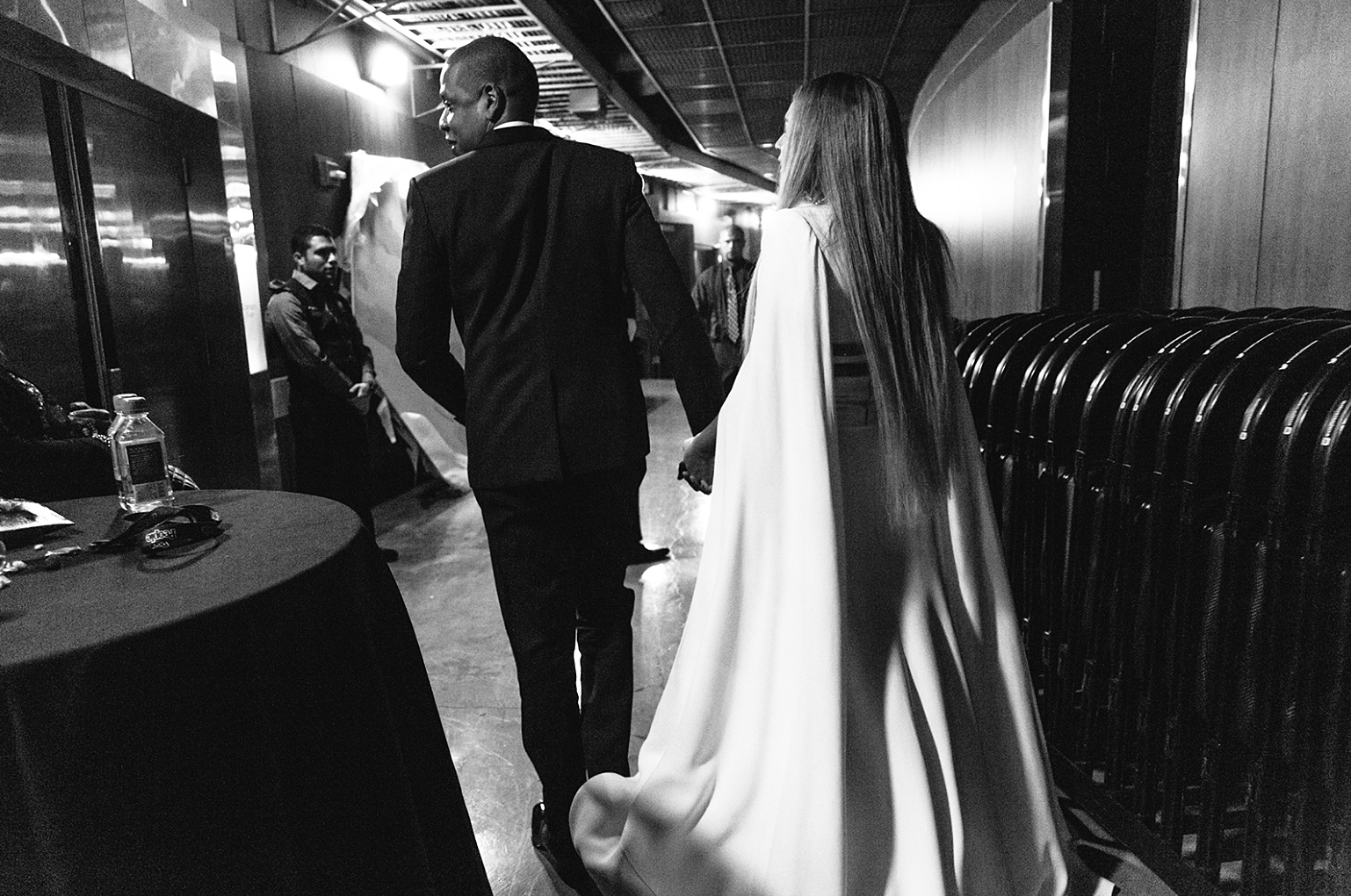 Beyonce and Jay Z holding hands.