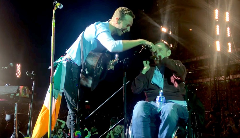 Chris Martin and fan.