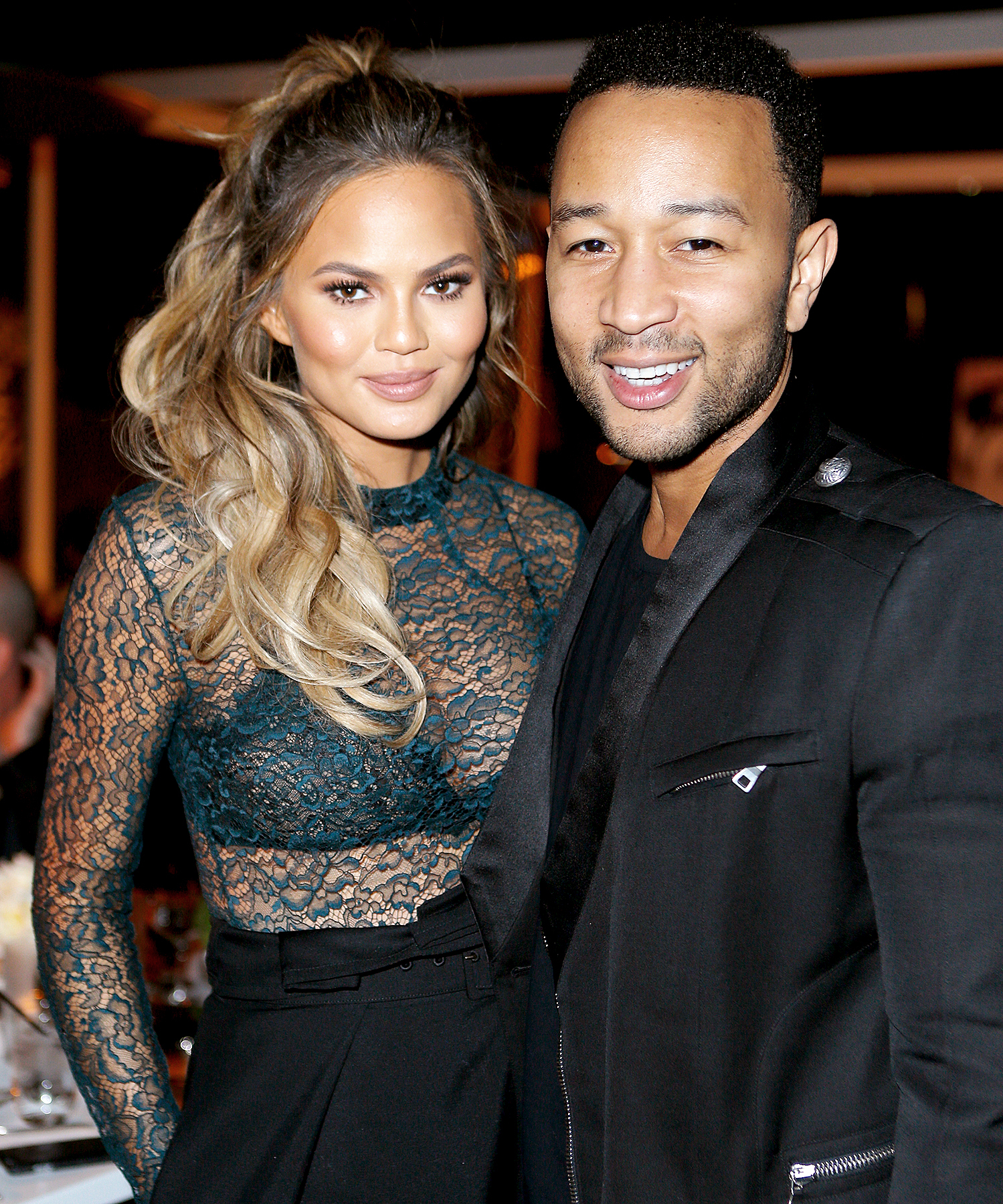 Chrissy Teigen and John Legend attend The Hollywood Reporter's Beauty Dinner at The London West Hollywood on November 11, 2015.