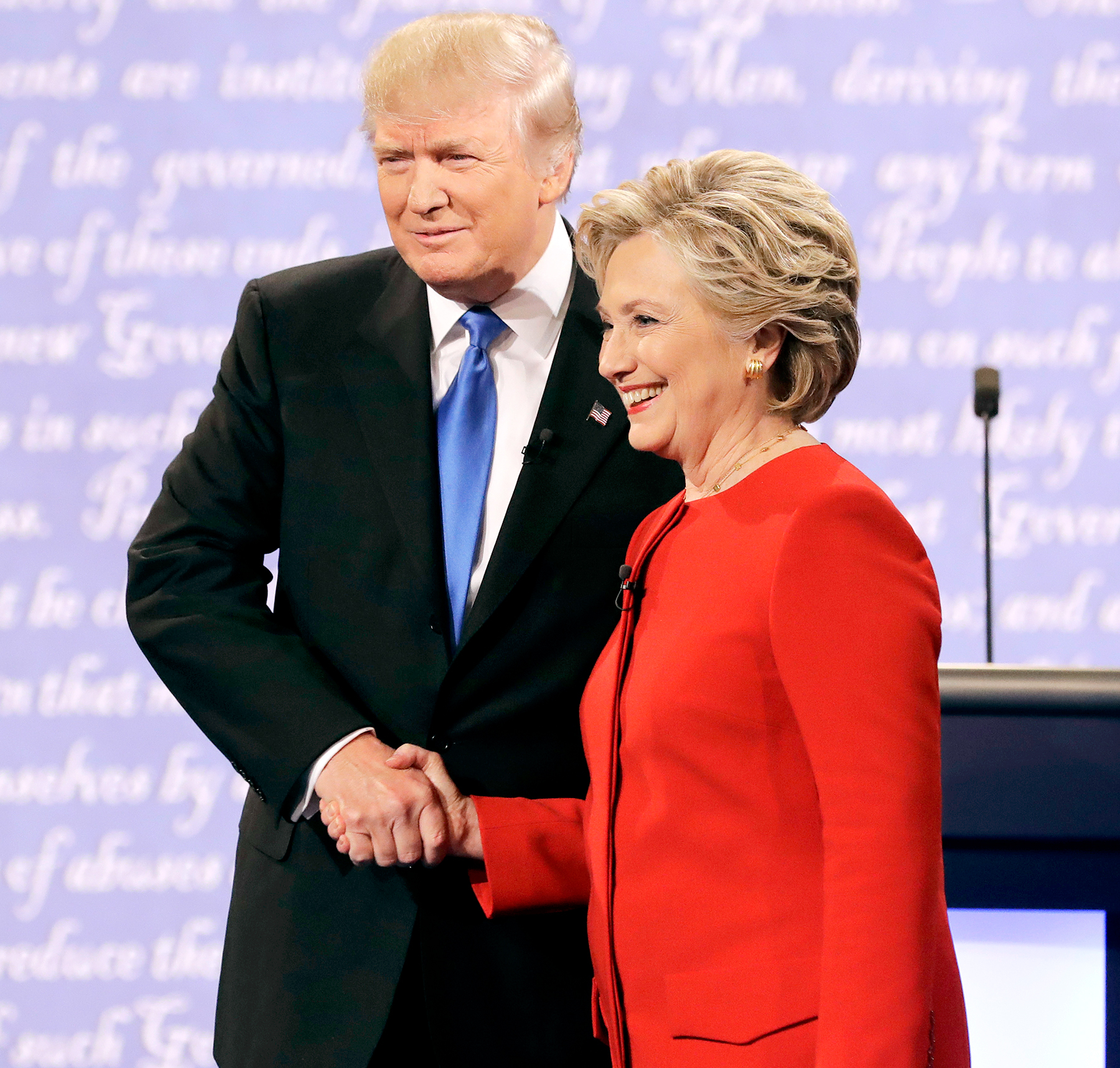 Republican presidential nominee Donald Trump shakes hands with Democratic presidential nominee Hillary Clinton during the presidential debate at Hofstra University in Hempstead, N.Y., Monday, Sept. 26, 2016.