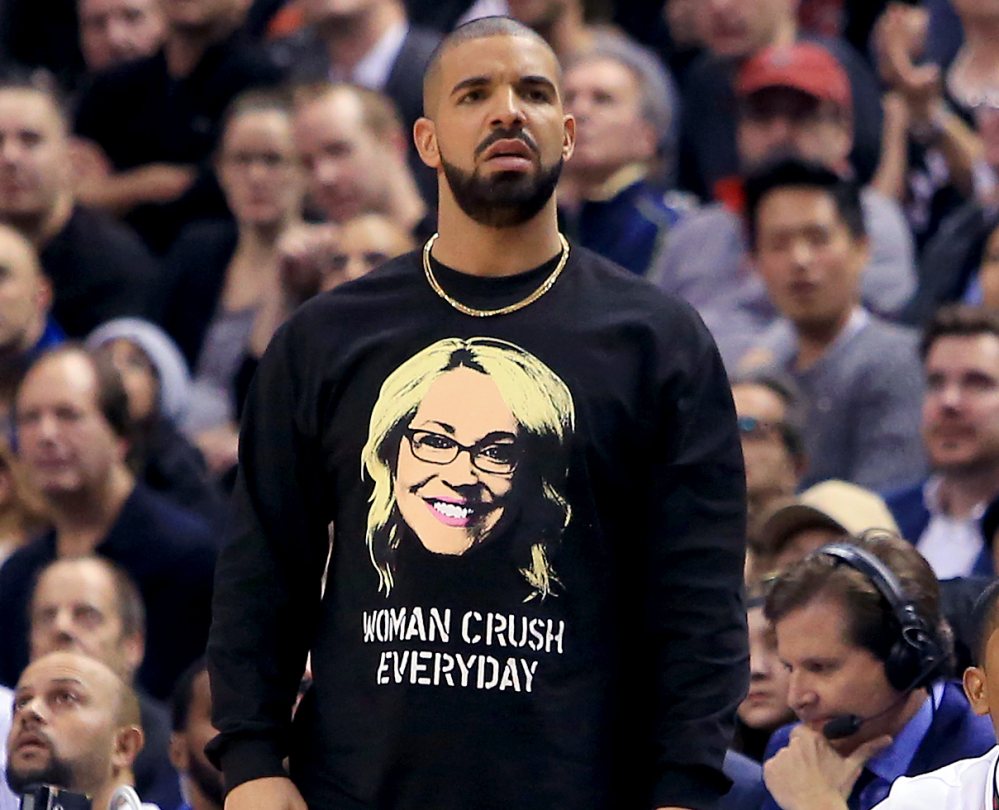 Drake looks on from his courtside seat during the second half of an NBA game between the Golden State Warriors and the Toronto Raptors at Air Canada Centre on November 16, 2016 in Toronto, Canada.