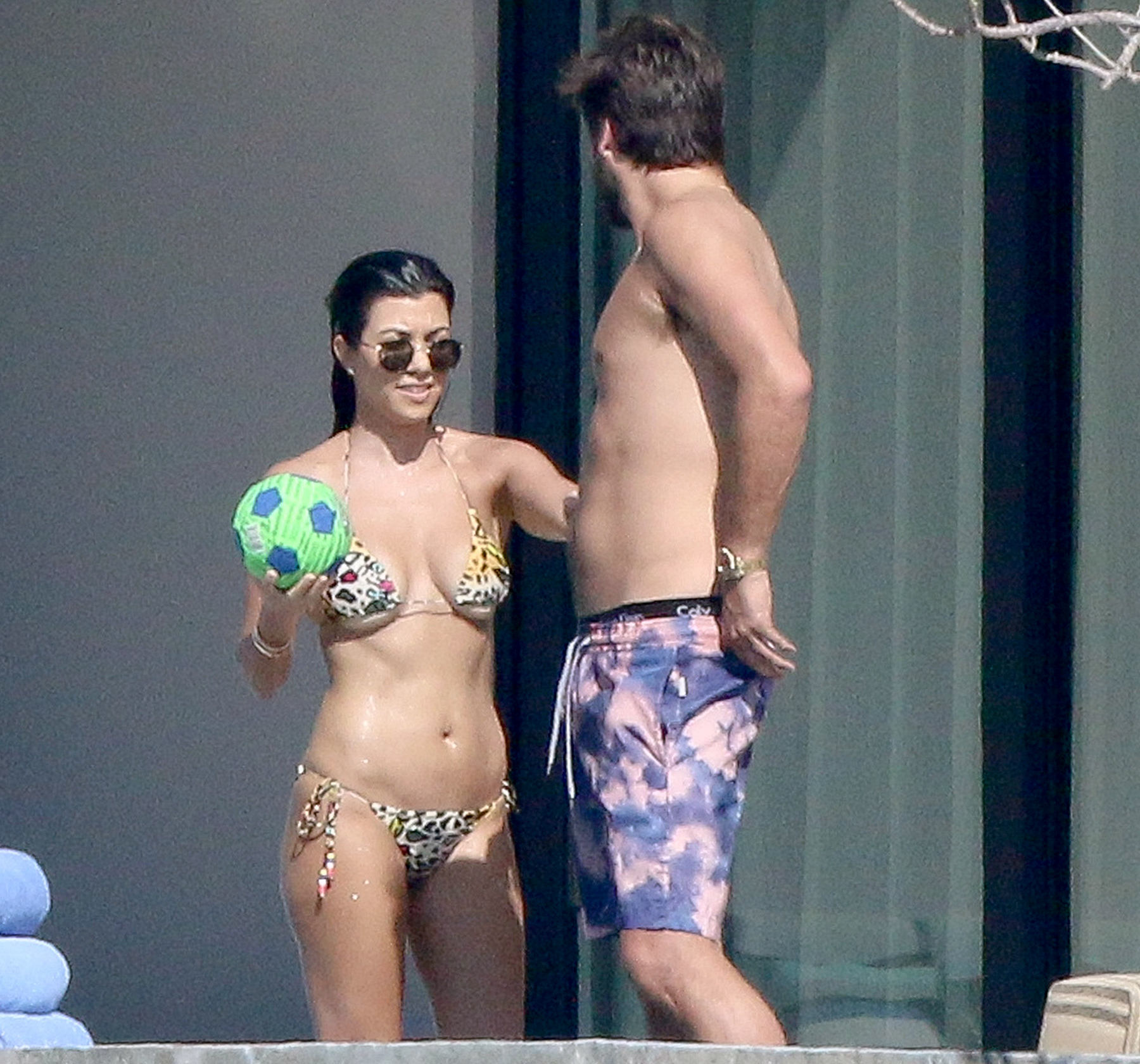 Kourtney Kardashian and Scott Disick arrive at the Los Cabos airport on a private flight to spend a romantic weekend together.
