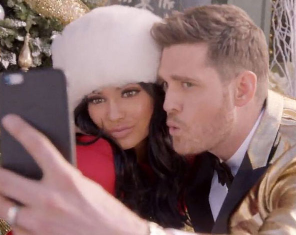 Kylie Jenner cozies up with Michael Buble