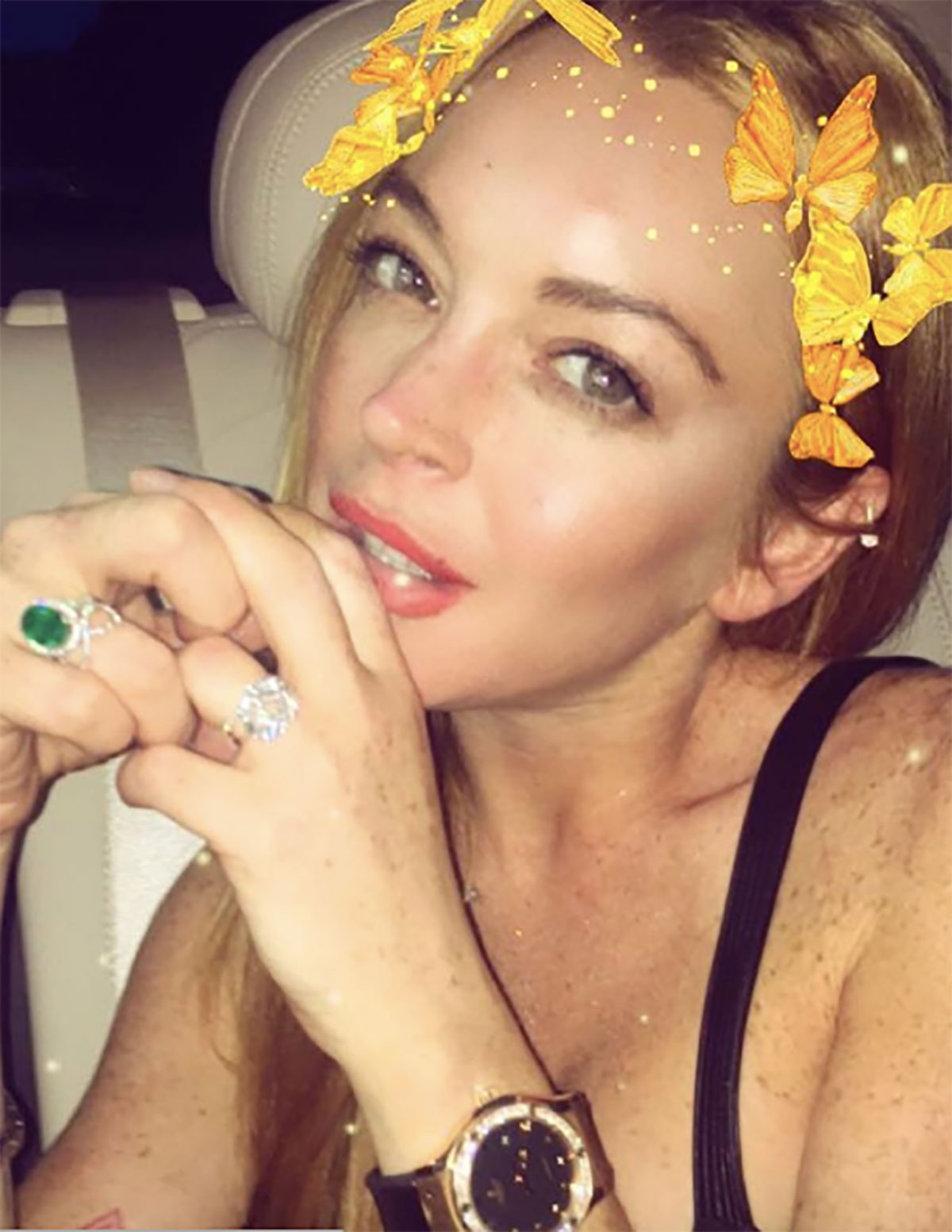 Lindsay Lohan Shows Off Her Engagement Ring After Cheating Scandal