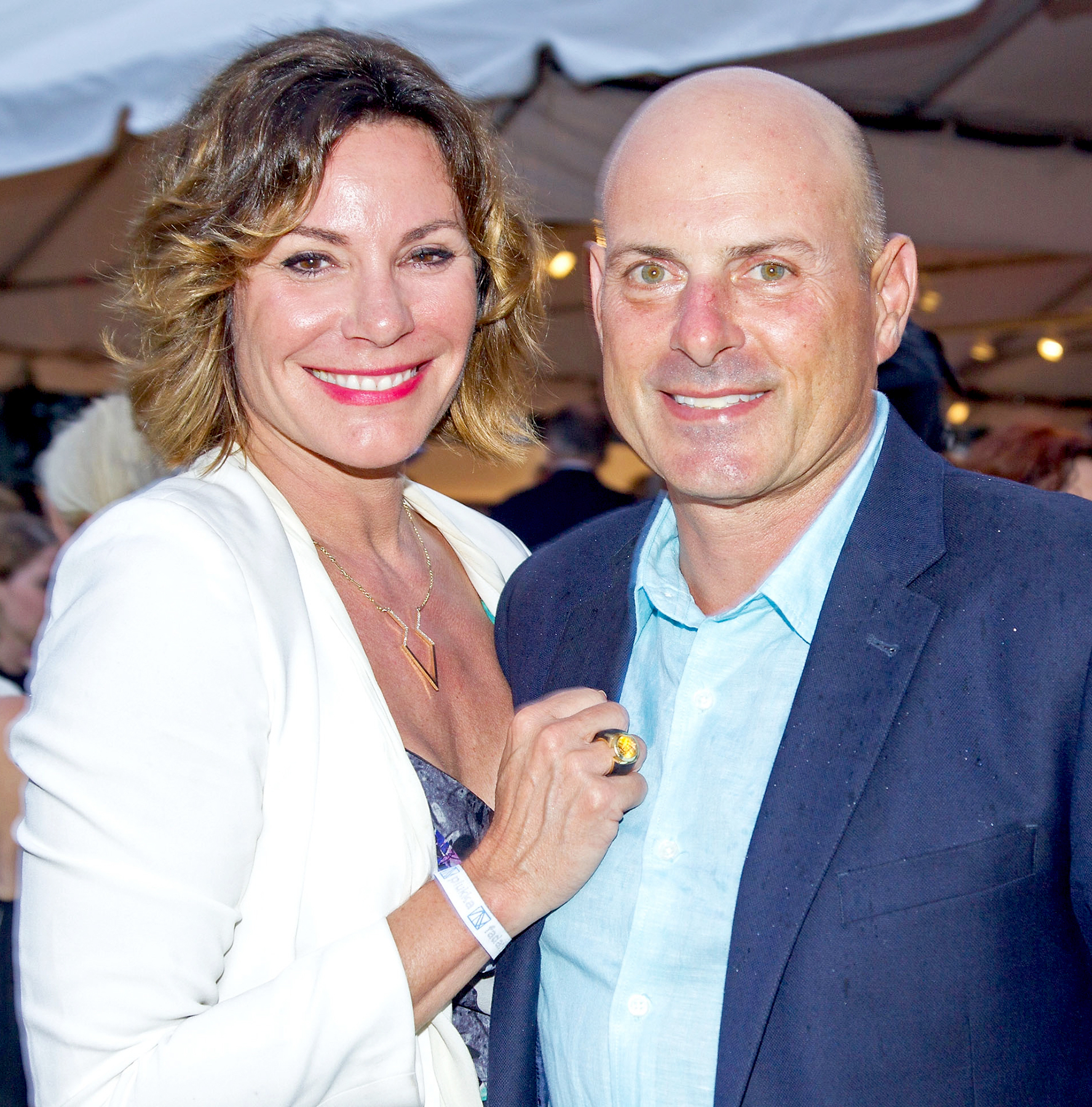 Luann de Lesseps and Tom D'Agostino Jr. attend the 23rd Annual Watermill Summer Benefit at The Watermill Center on July 30, 2016 in Water Mill, New York.