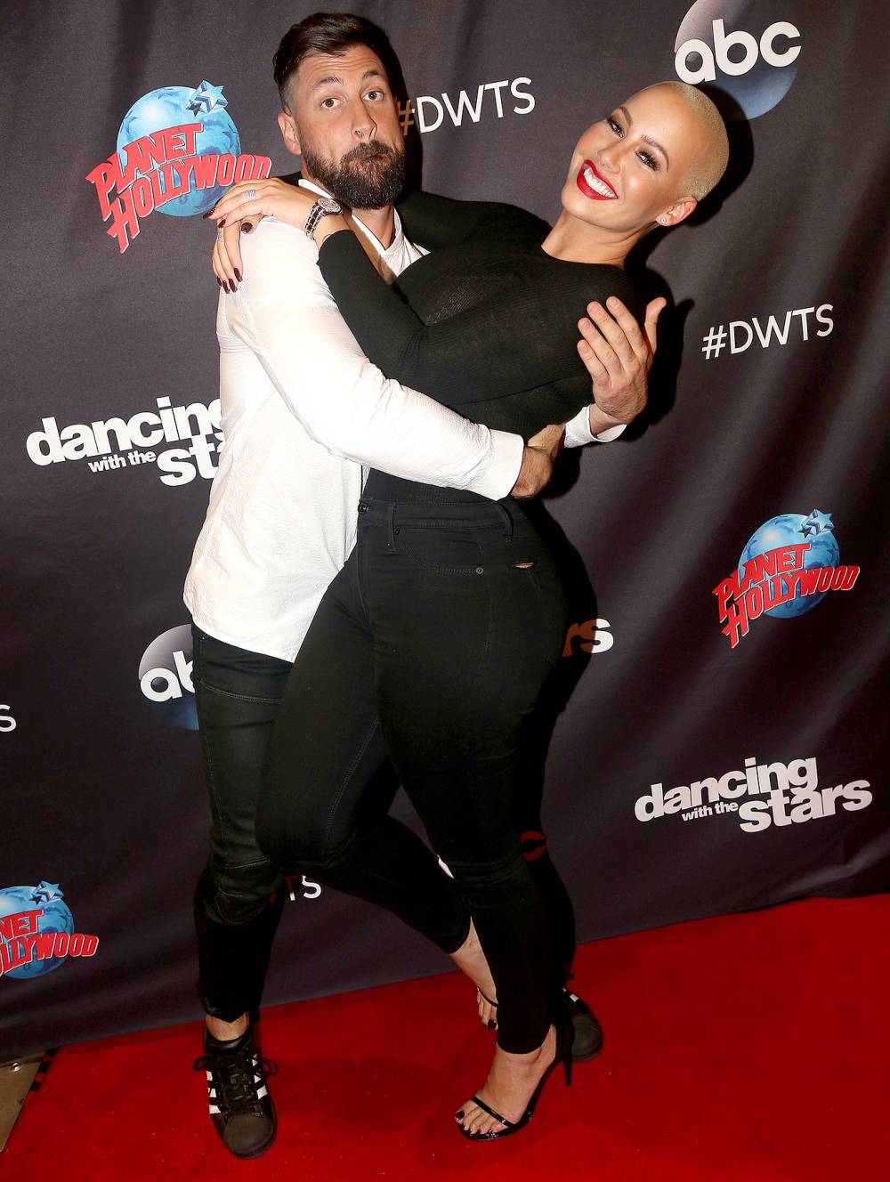 Maksim Chmerkovskiy and Amber Rose pose for season 23.