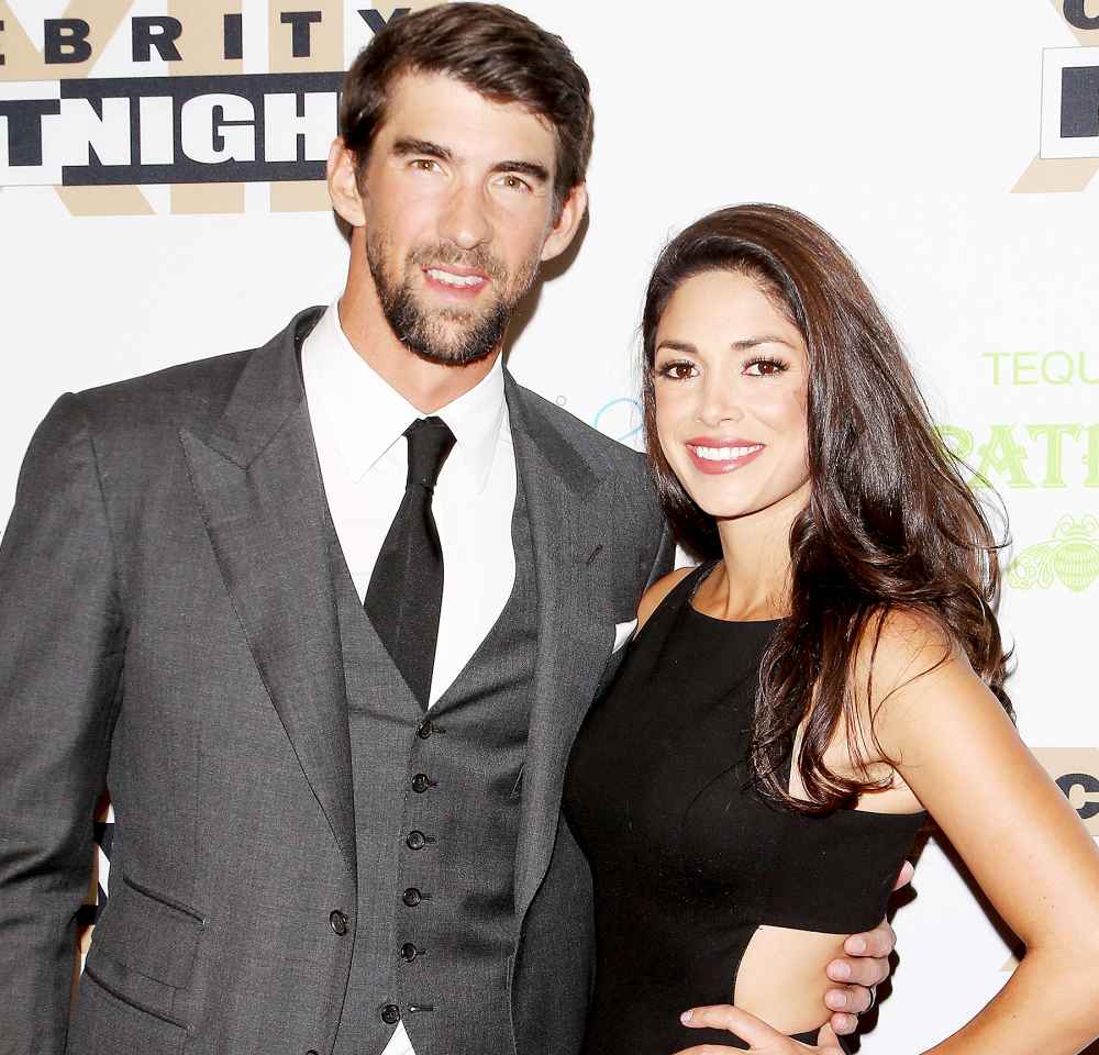 Michael Phelps and Nicole Johnson arrive at Muhammad Ali's Celebrity Fight Night XXIII at the JW Marriott Phoenix Desert Ridge Resort & Spa on March 18, 2017 in Phoenix, Arizona.