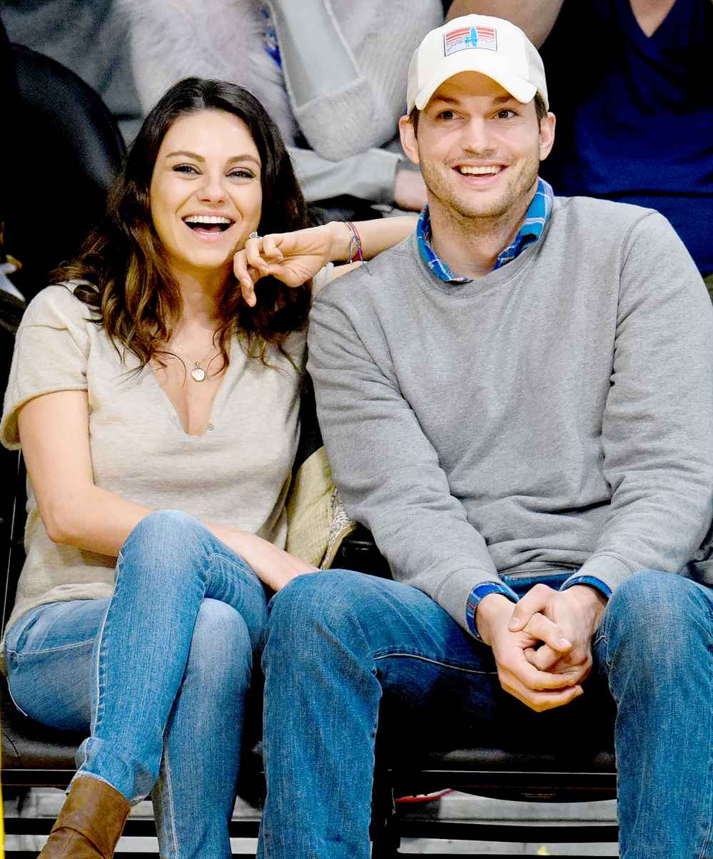 Mila Kunis and Ashton Kutcher attend a basketball game between the Oklahoma City Thunder and the Los Angeles Lakers at Staples Center on December 19, 2014 in Los Angeles, California.