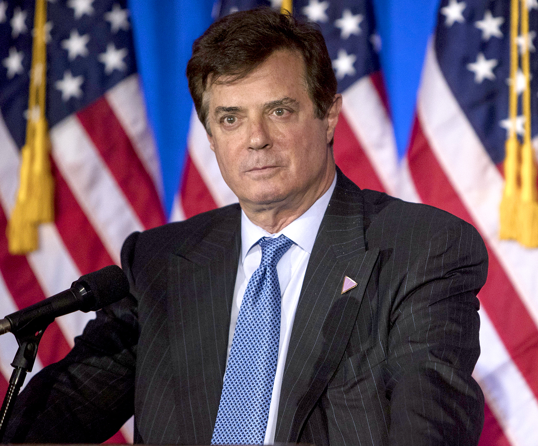 Paul Manafort stands on stage before Donald Trump, presumptive Republican presidential nominee, speaks during a primary night event at the Trump National Golf Club Westchester in Briarcliff Manor, New York, U.S., on Tuesday, June 7, 2016.