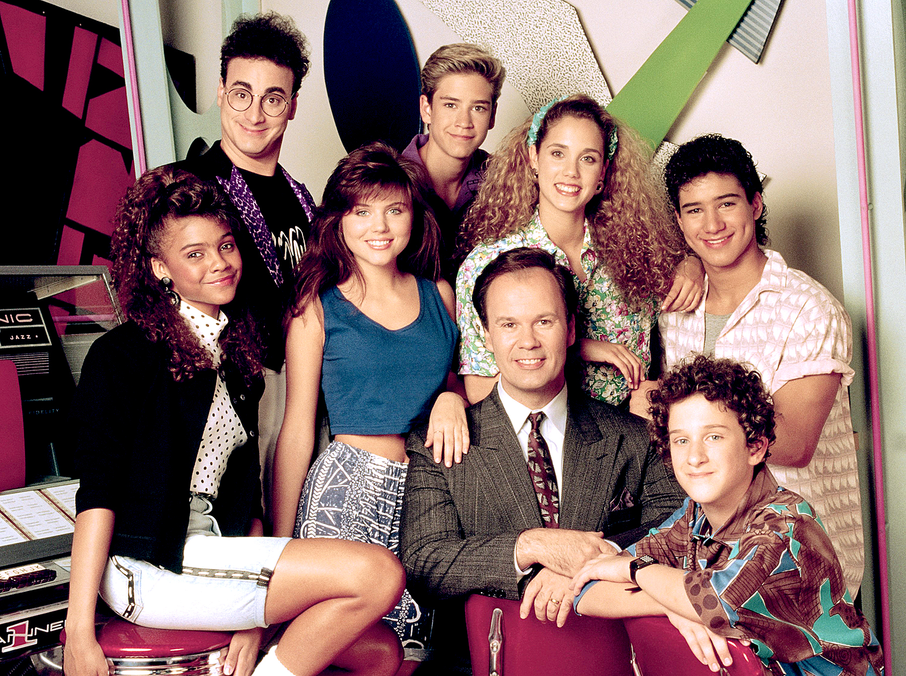 Lark Voorhies as Lisa Turtle, Ed Alonzo as Max, Tiffani Thiessen as Kelly Kapowski, Mark-Paul Gosselaar as Zack Morris, Dennis Haskins as Mr. Richard Belding, Elizabeth Berkley as Jessie Spano, Dustin Diamond as Screech Powers, and Mario Lopez as A.C. Slater on Saved By The Bell.