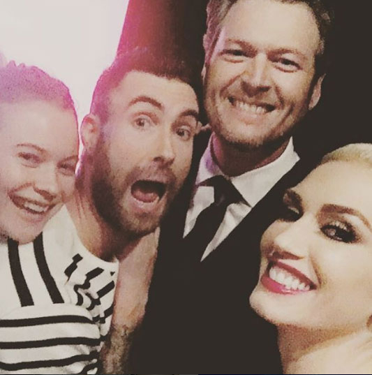 Gwen Stefani and Blake Shelton take a selfie with Adam Levine and Behati Prinsloo