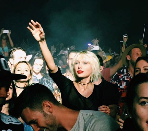 Taylor Swift looks at Calvin Harris with heart eyes