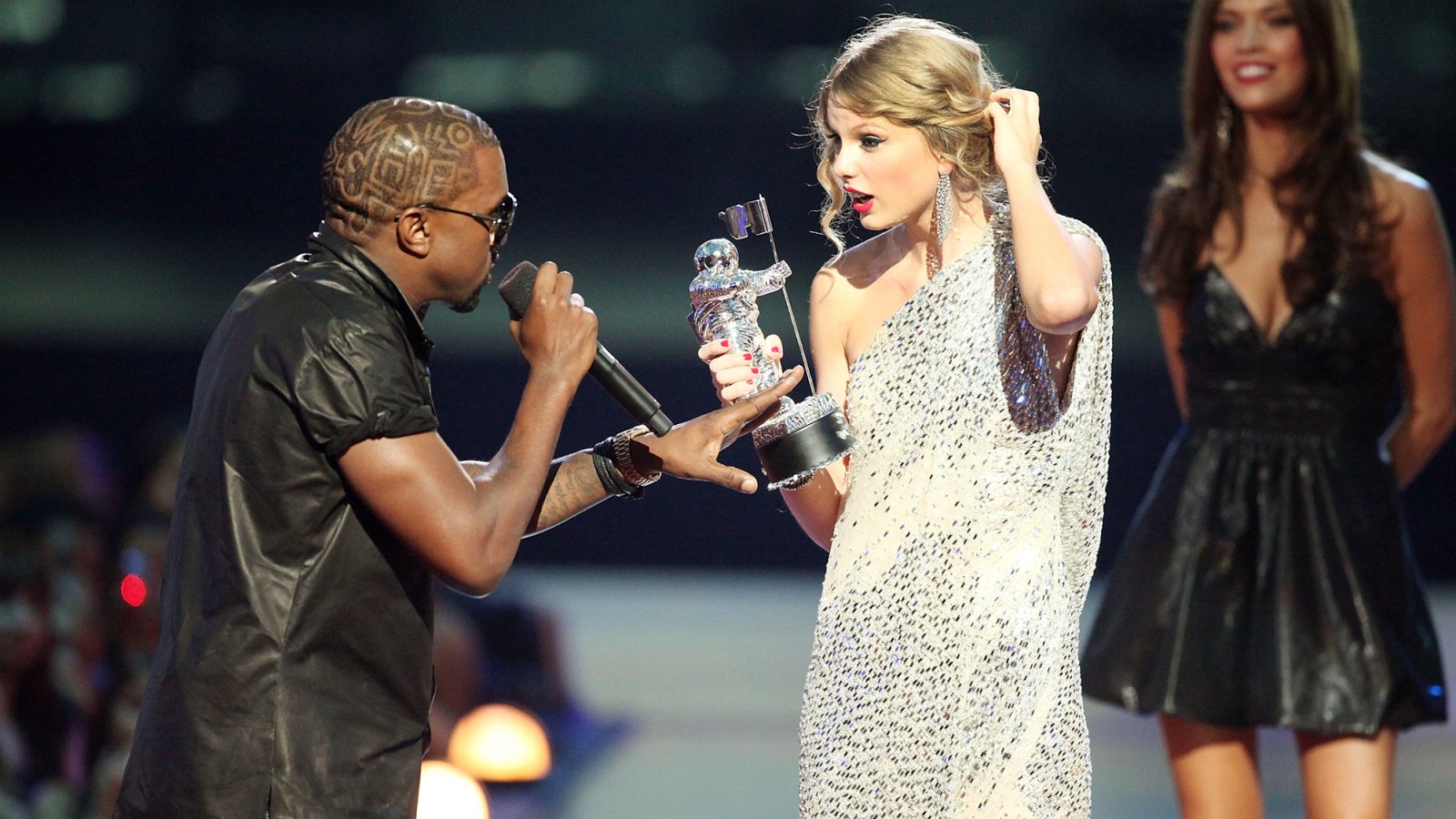 Kanye West jumps onstage after Taylor Swift